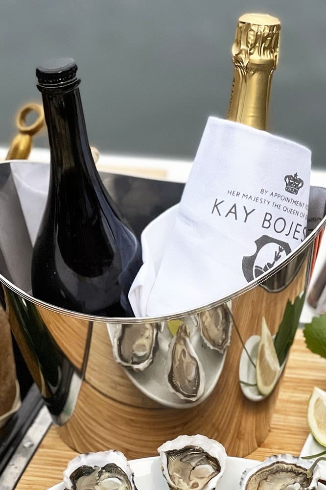 Here you see the COOLER wine cooler from Kay Bojesen with two champagne bottles. 