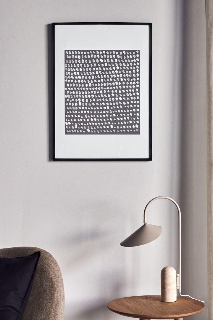 17 stylish Scandinavian wall posters to give your walls an update - here you see the abstract Multitude poster from Scandi Living in tones of grey and white.
