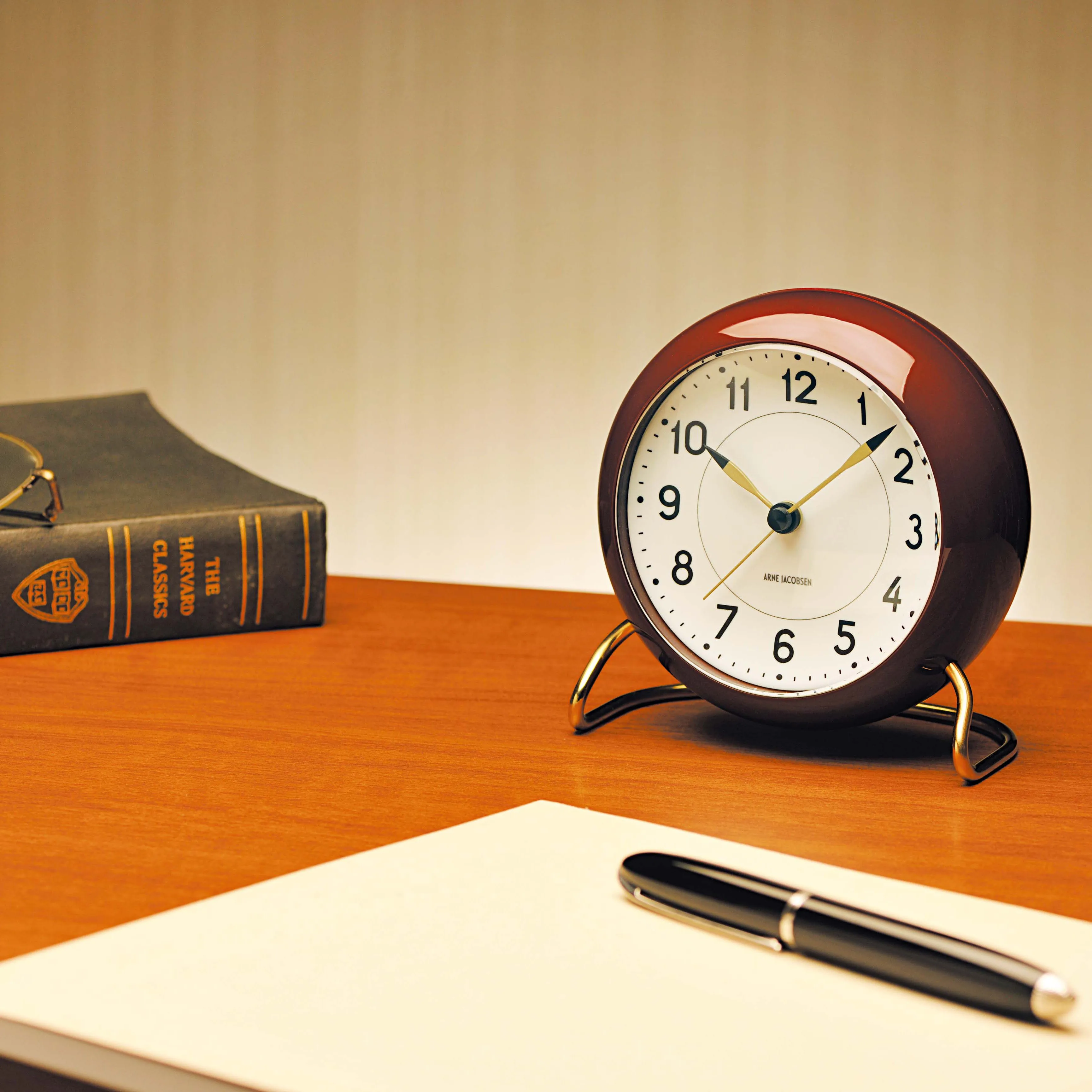 AJ Station table clock burgundy from Arne Jacobsen Clocks
