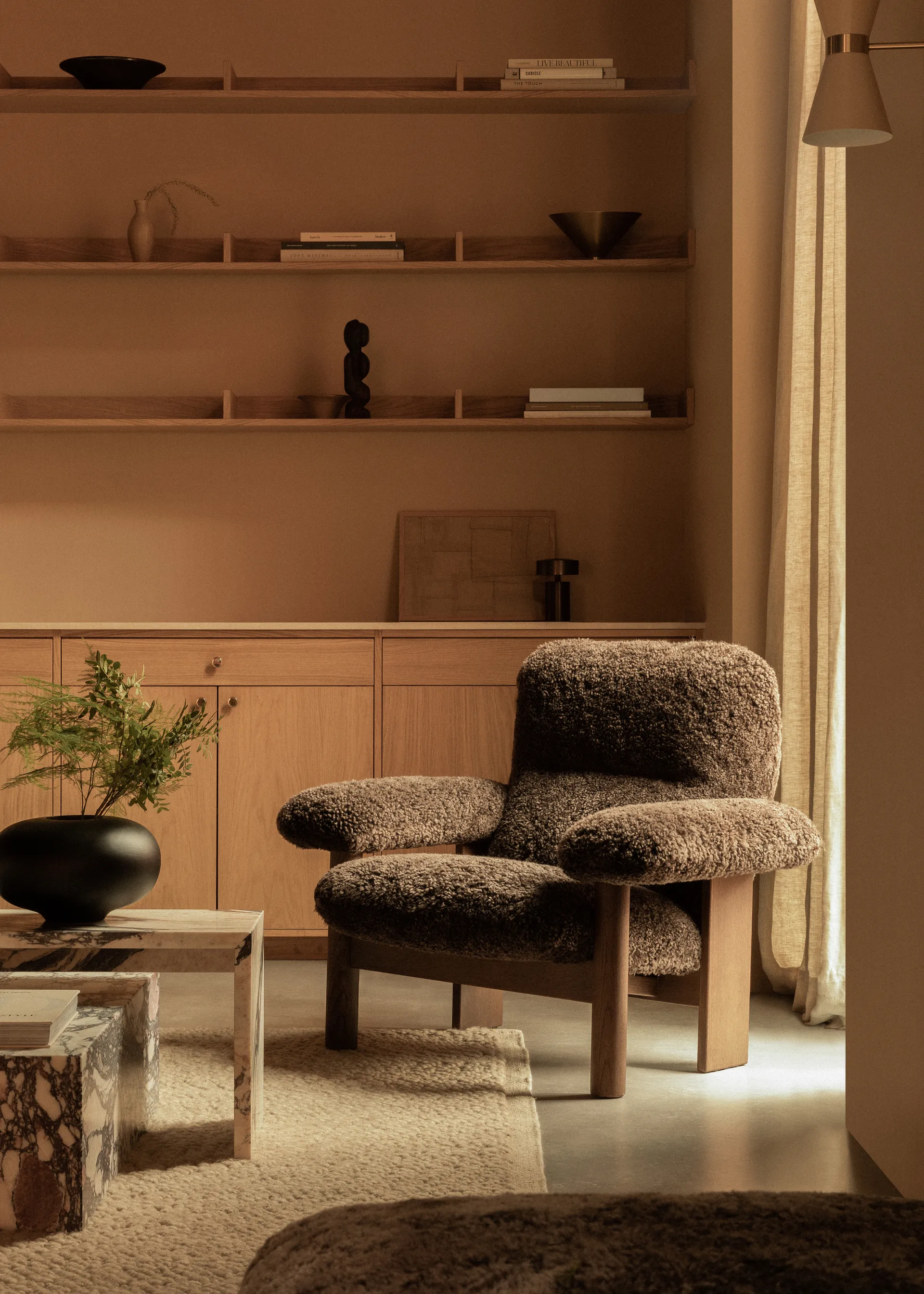 Brasilia armchair, Dark oak-Nature sheepskin curly Audo Copenhagen