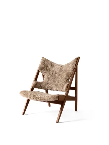 Knitting lounge chair, Sheepskin sahara, walnut legs Audo Copenhagen