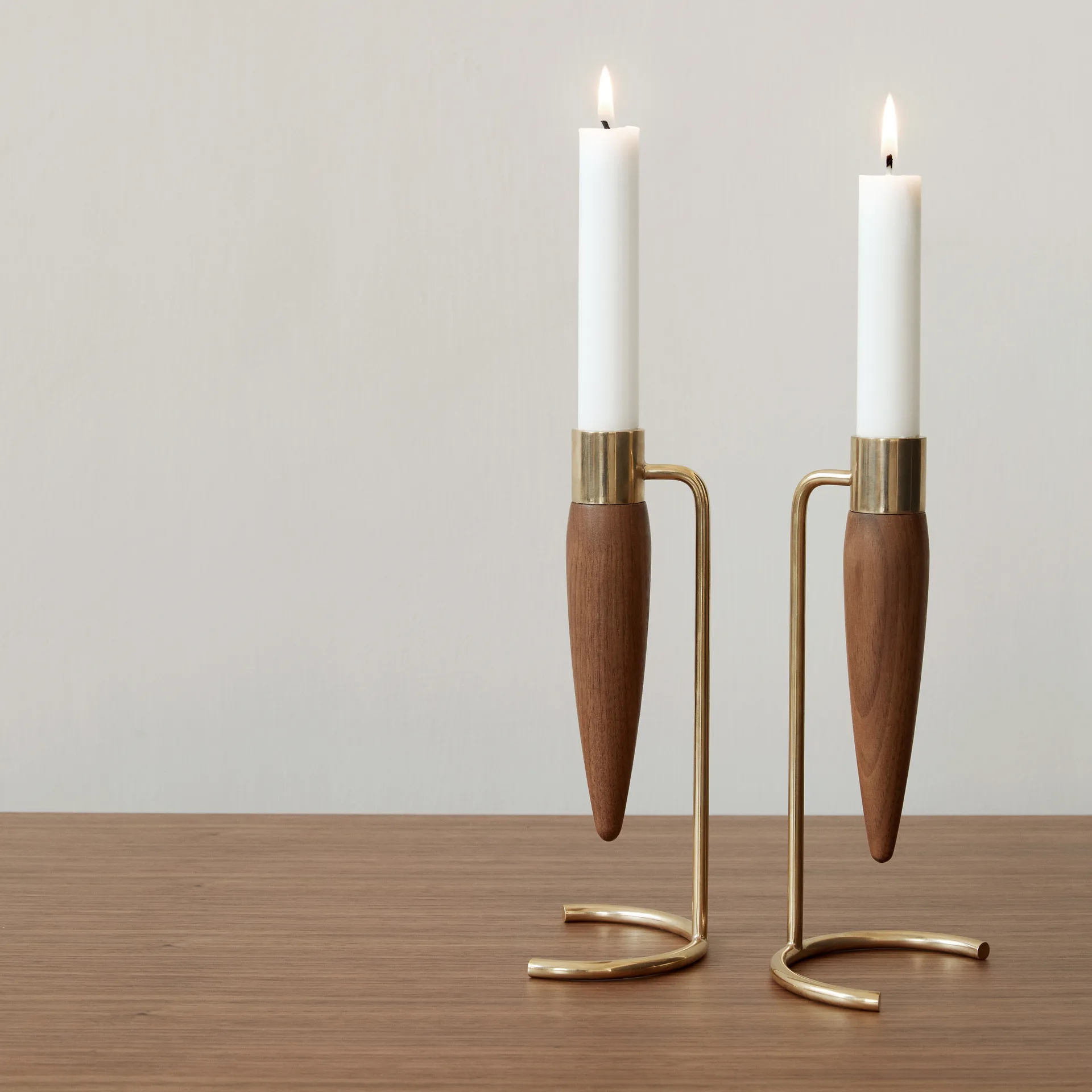 Umanoff candle sticks, polished brass-wallnut Audo Copenhagen