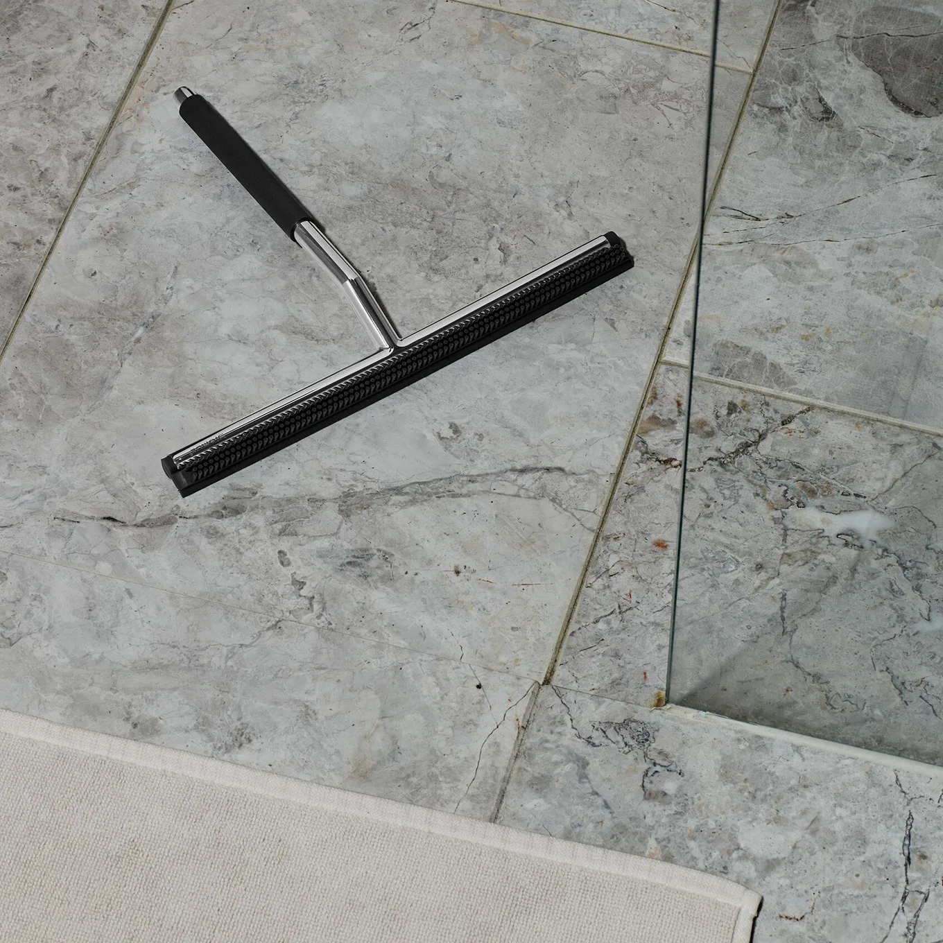 Lavea shower scraper with hook from Blomus