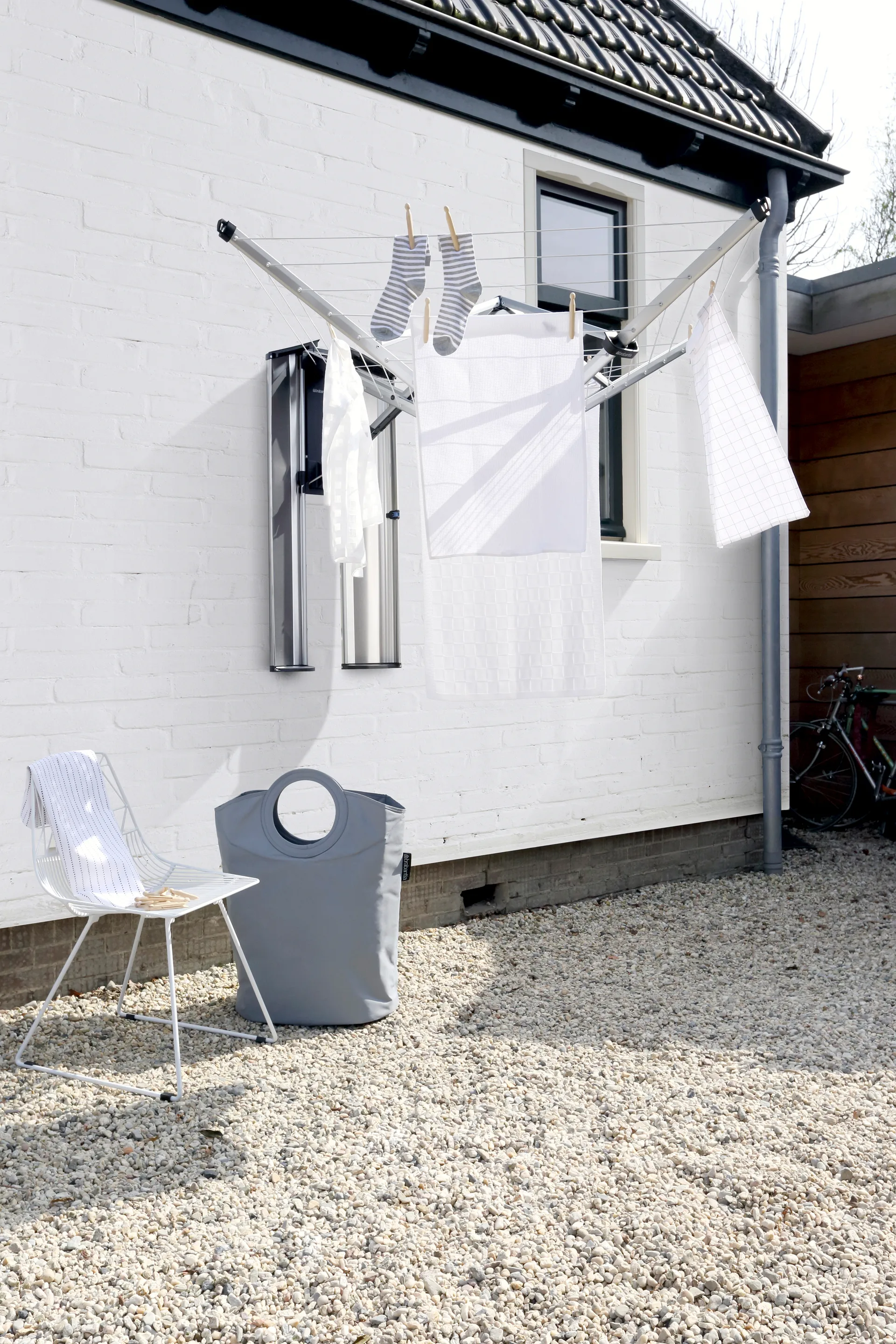 WallFix clothesline 24m with fabric cover, Grey Brabantia