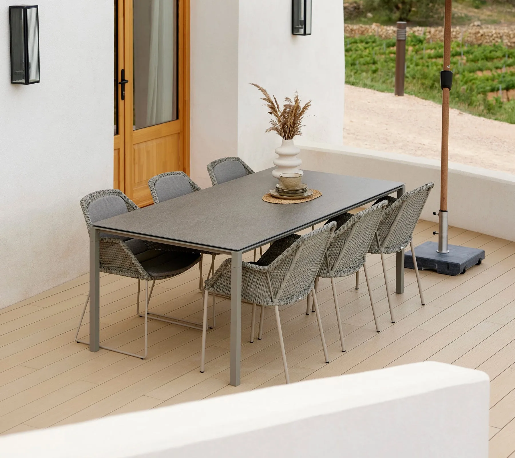 Breeze stackable armchair weave, Taupe Cane-line