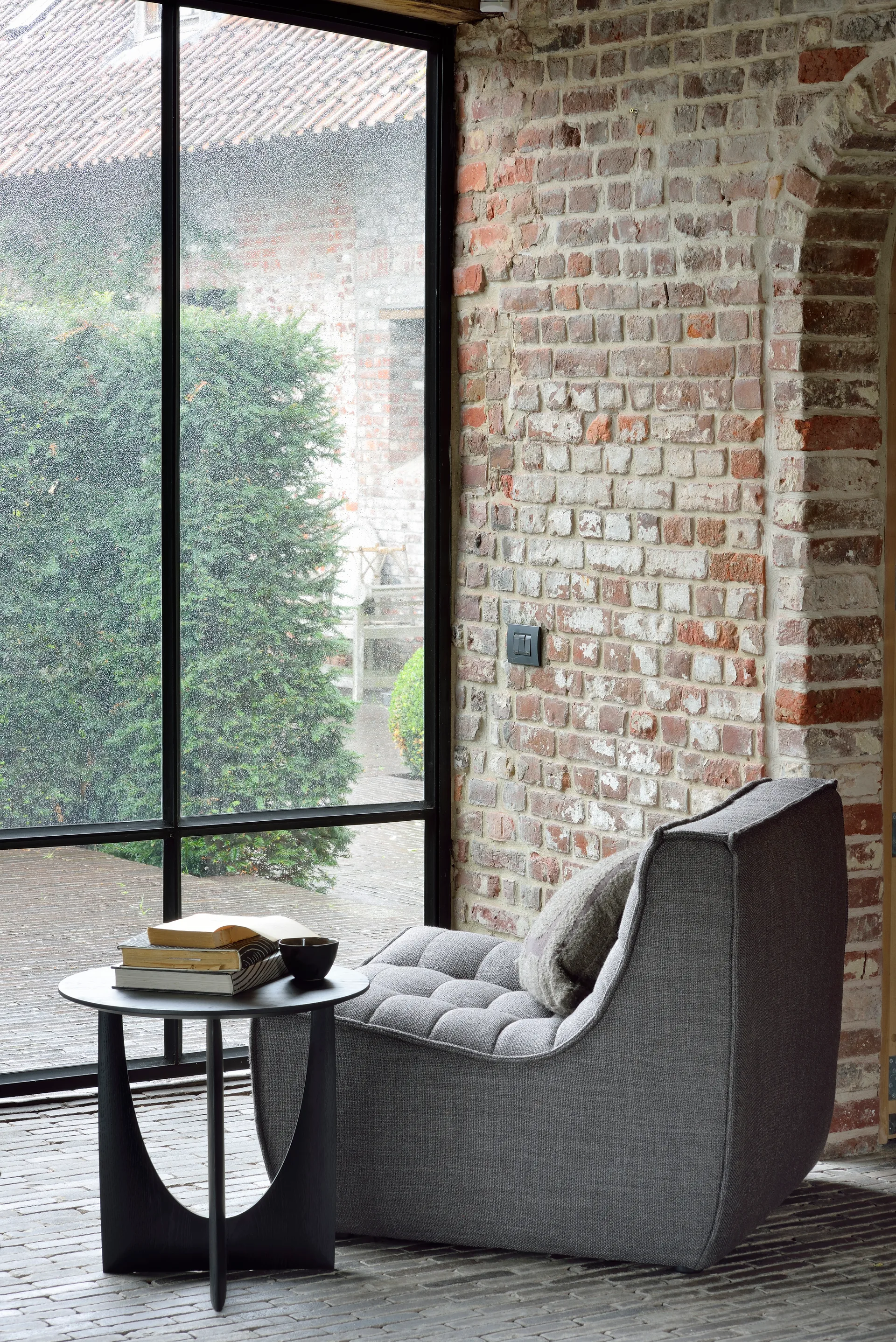 Geometric side table, Black oak Ø51 Ethnicraft