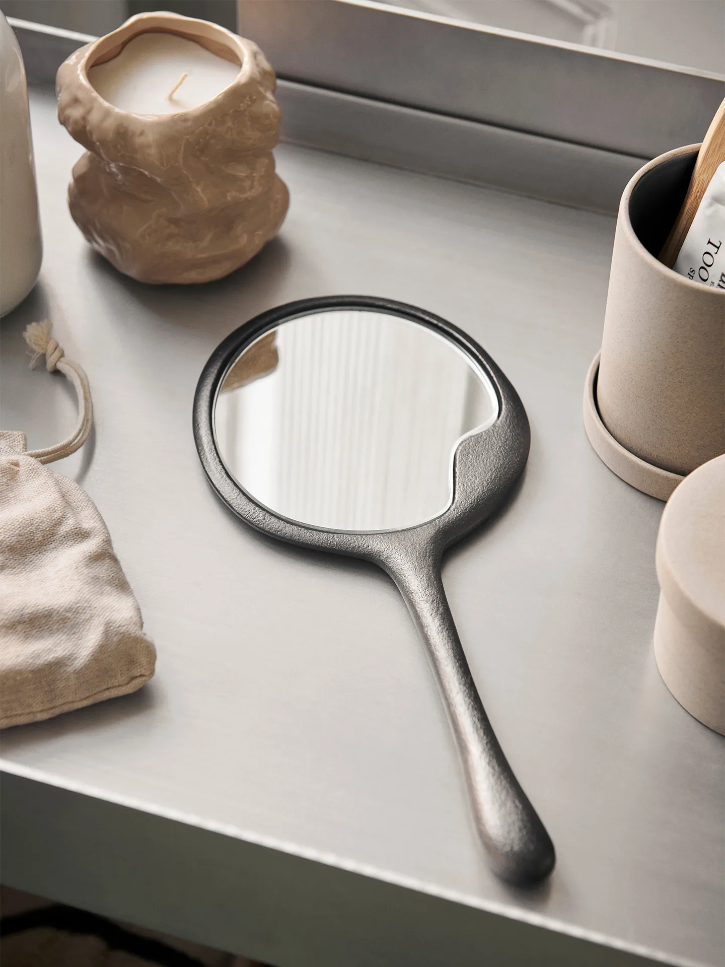 Lava hand mirror, Blackened Aluminium Ferm Living