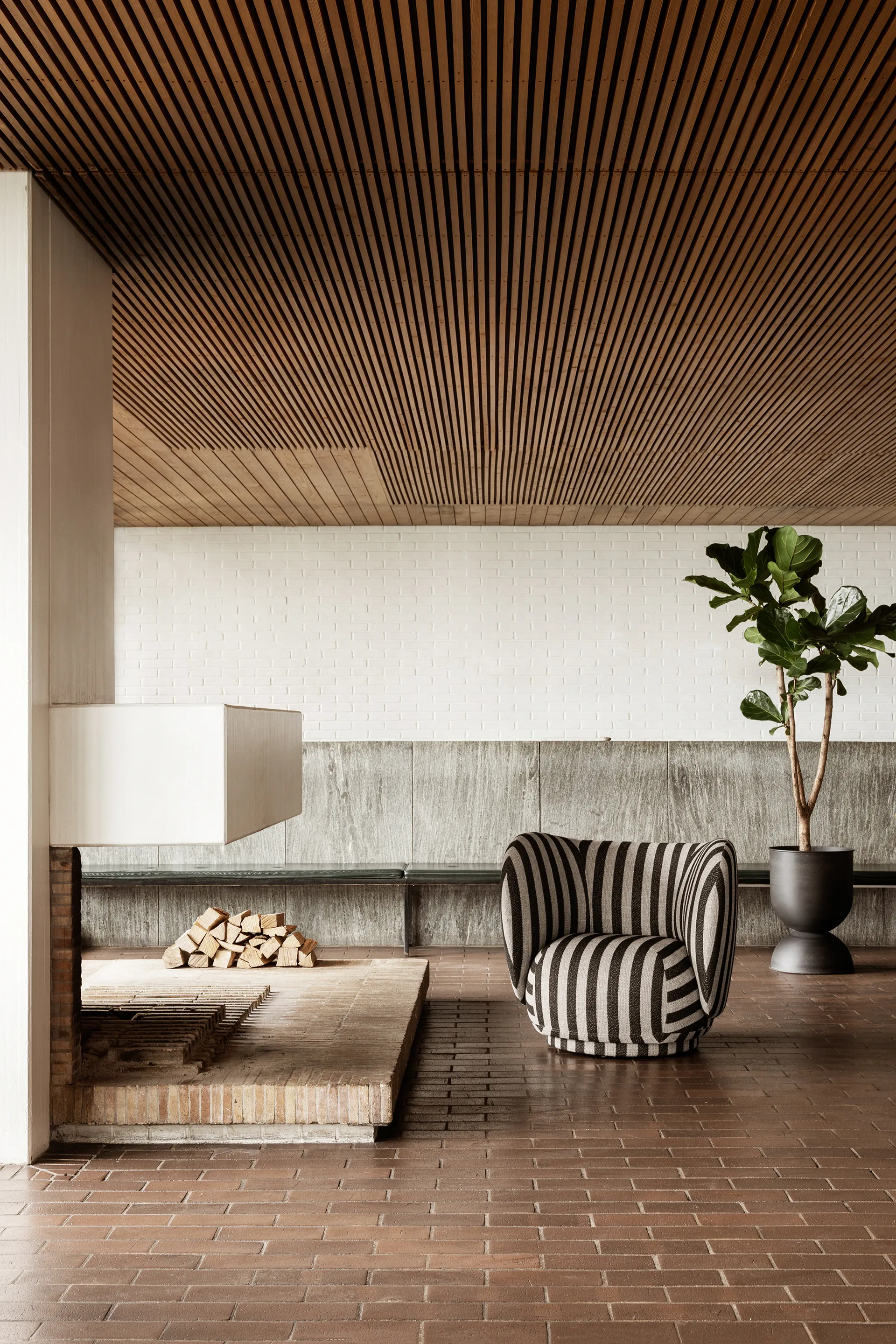 Rico lounge chair, Louisiana sand black Ferm Living