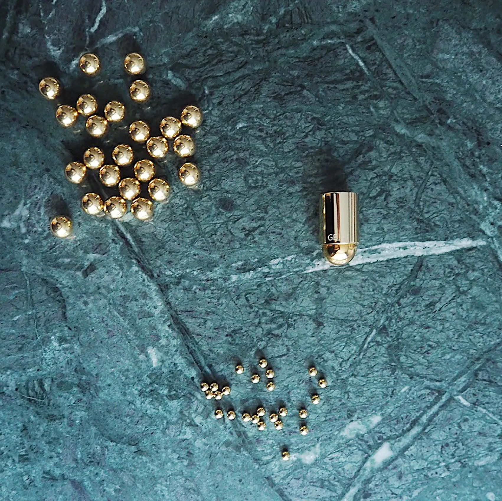 Molekyl candlestick 1, brass Gejst