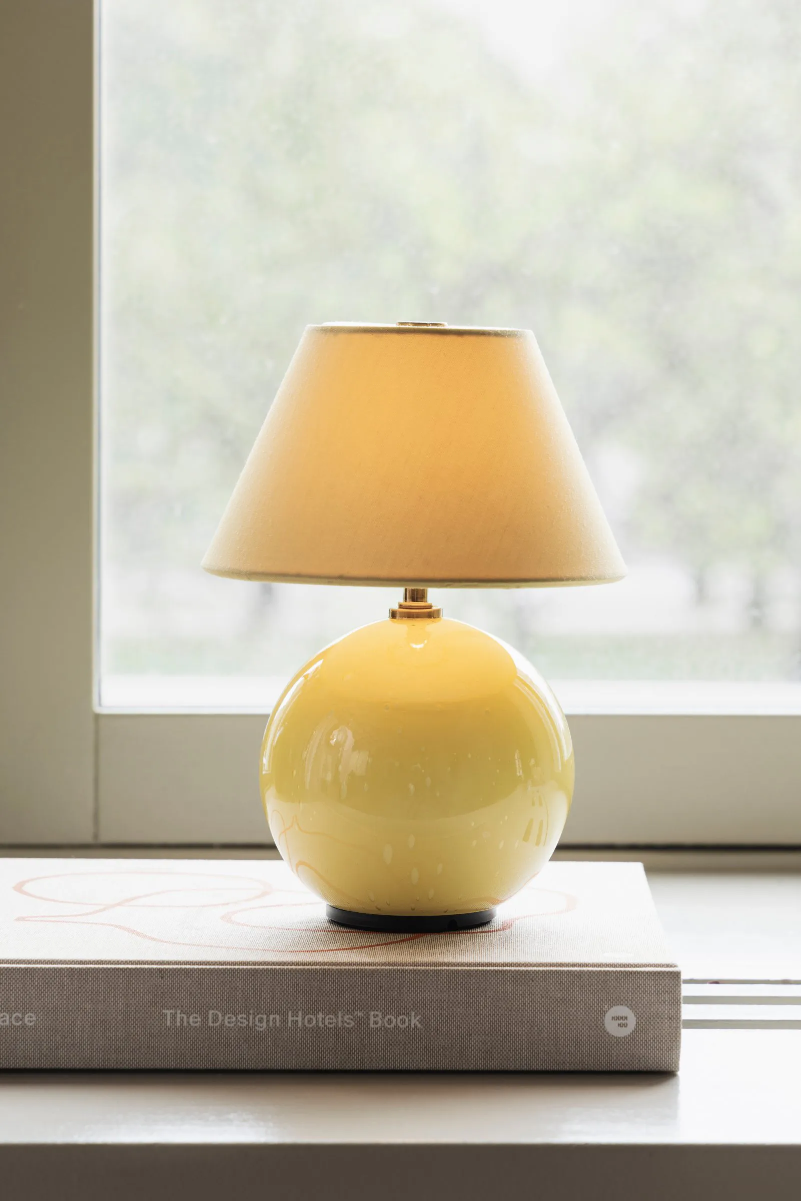Iris 16 portable table lamp, Butter yellow Globen Lighting
