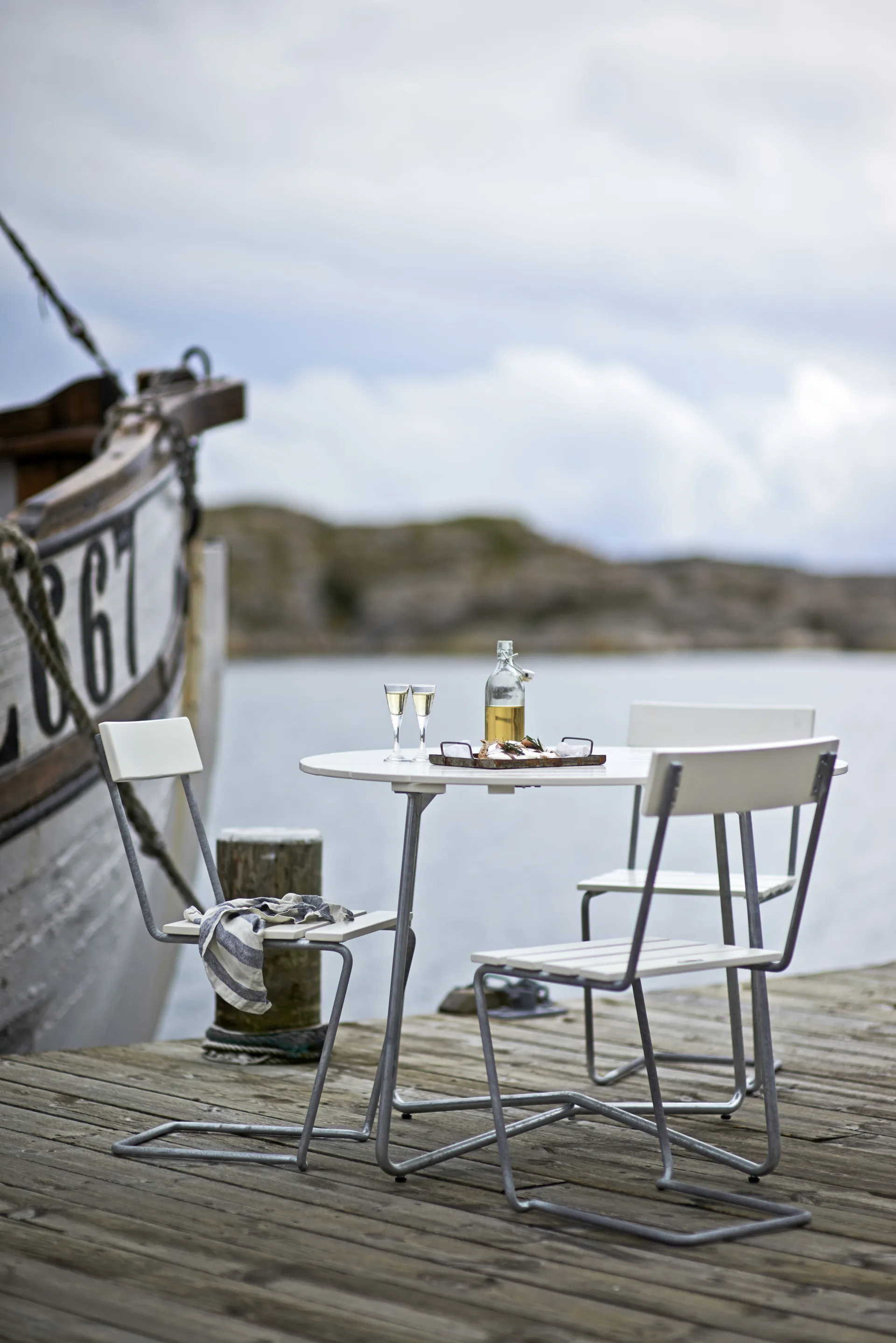 9A dining table, White lacquered oak Ø100 cm Grythyttan Stålmöbler
