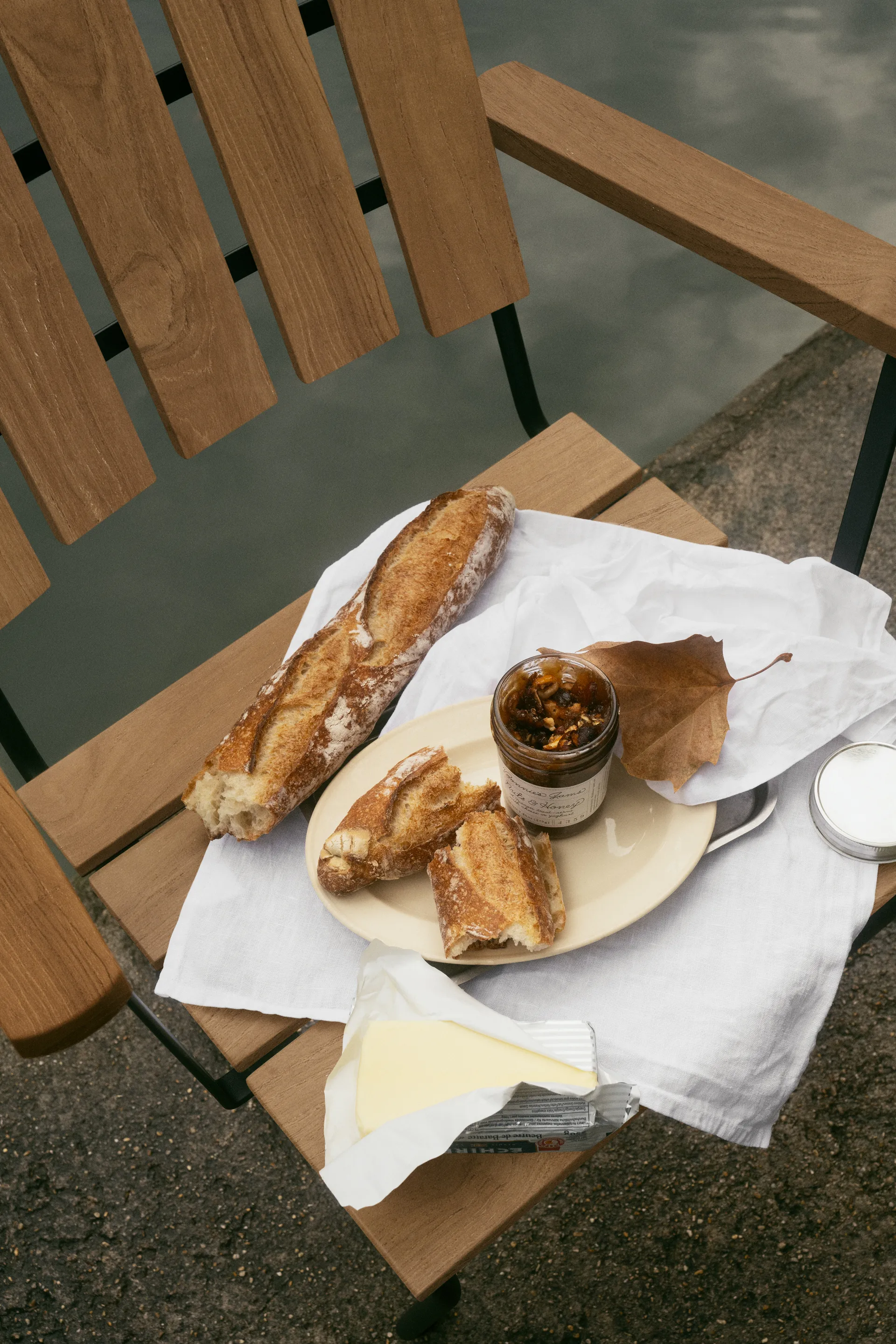 A2 armchair, Untreated teak-black Grythyttan Stålmöbler