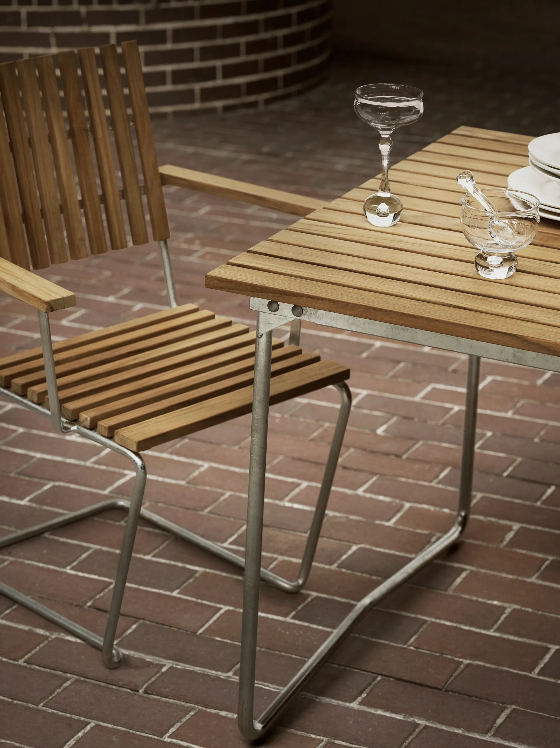 Bovik armchair, Teak-warm galvanized frame Grythyttan Stålmöbler