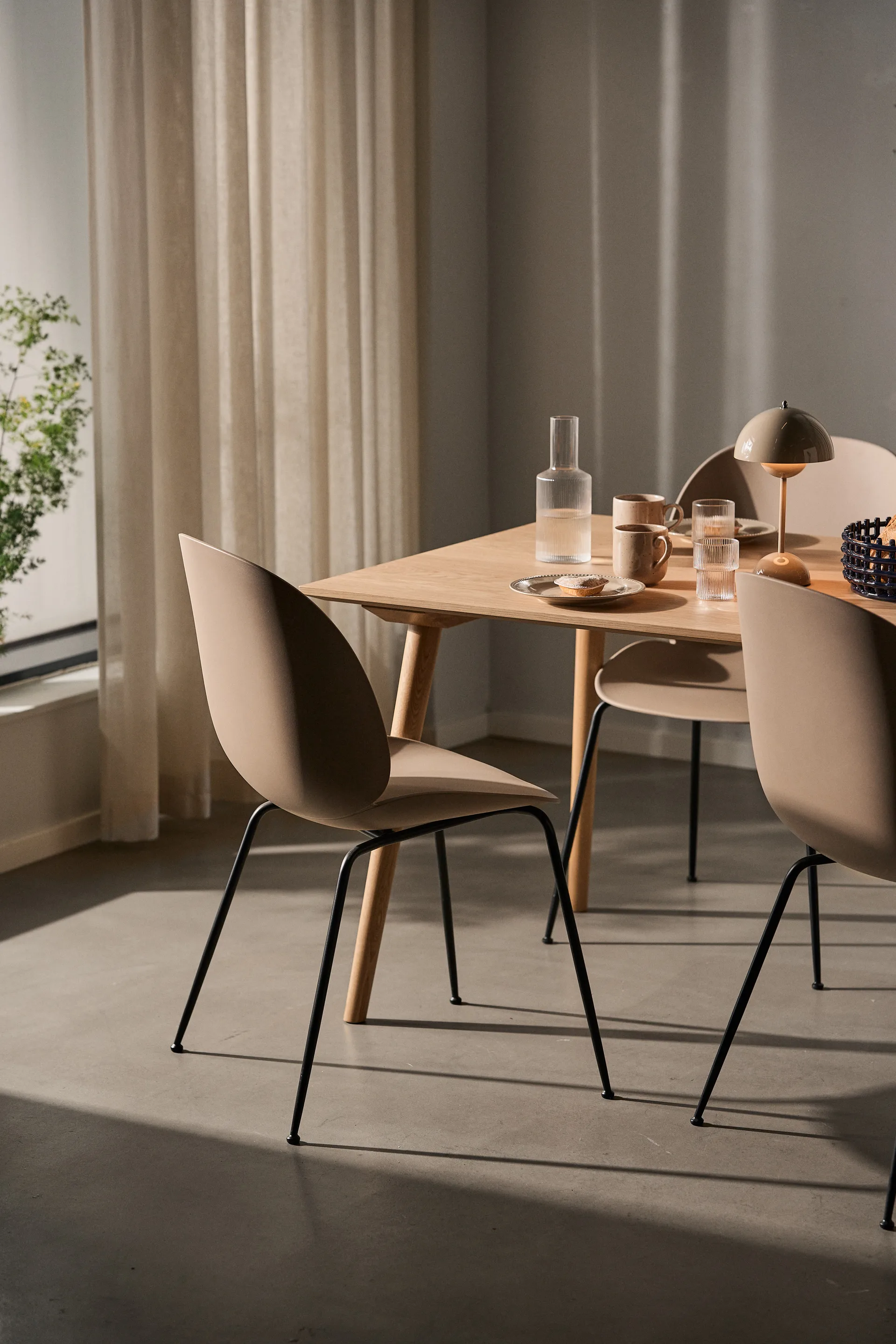 Beetle chair, New beige, black chromed steel legs GUBI