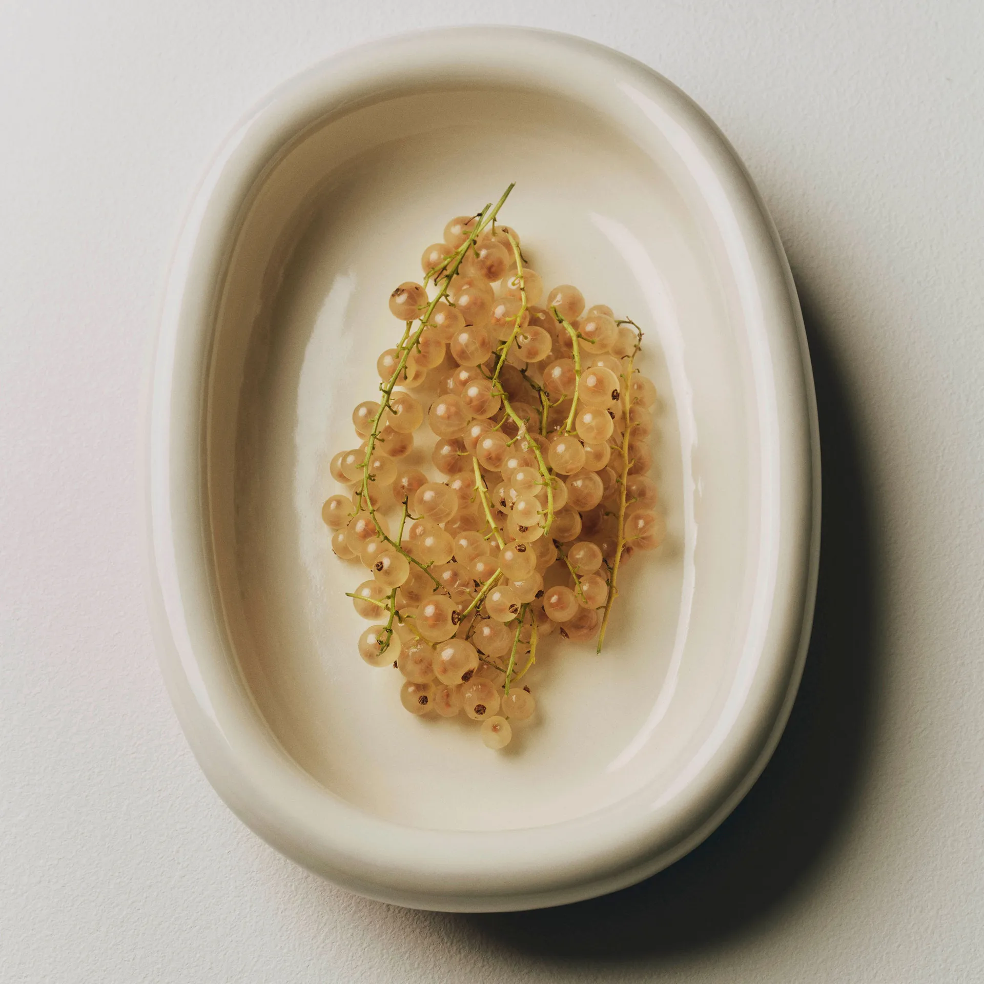 Barro oval serving plate, Off-white, large 27x36 cm HAY