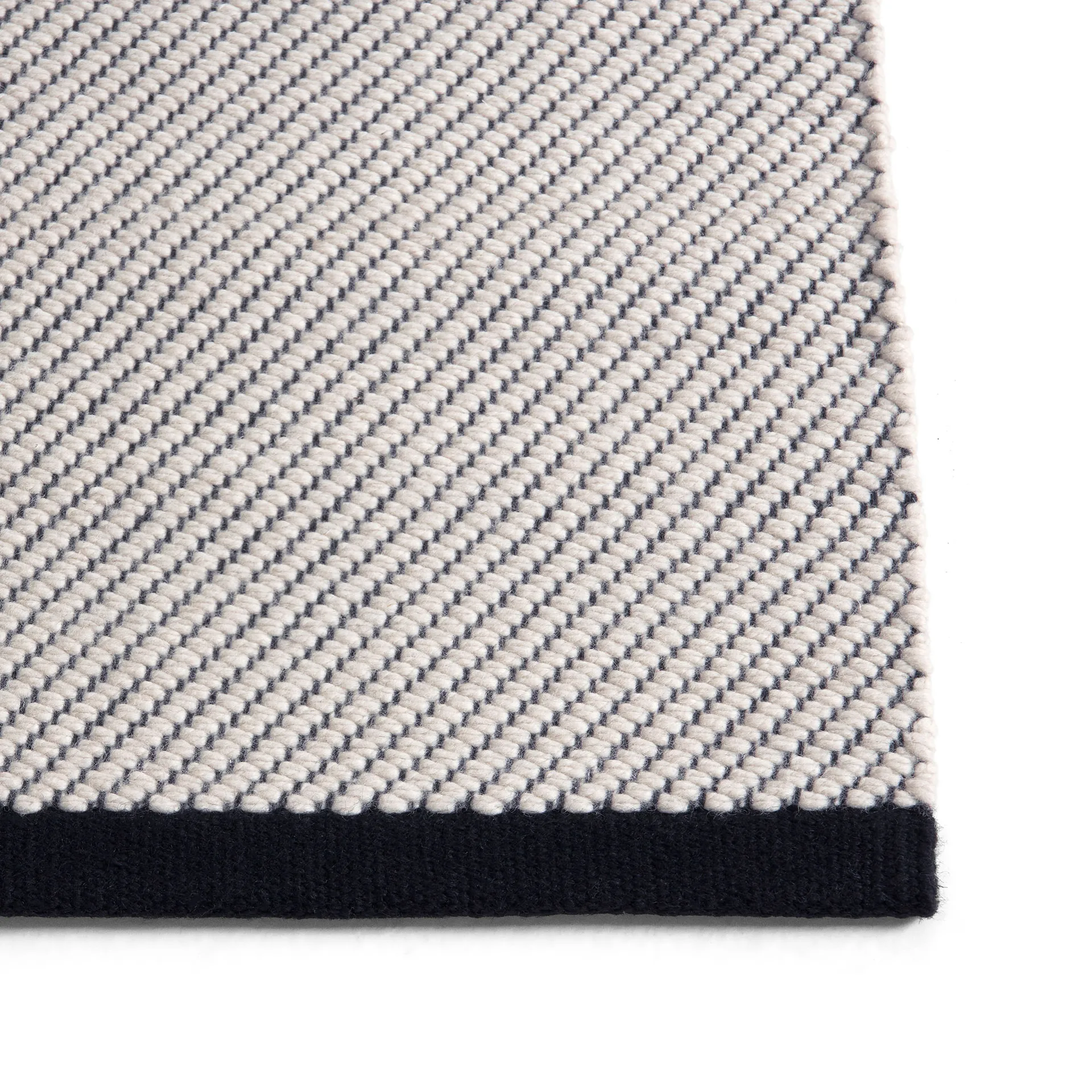 Bias rug 140x200 cm, Black tint HAY