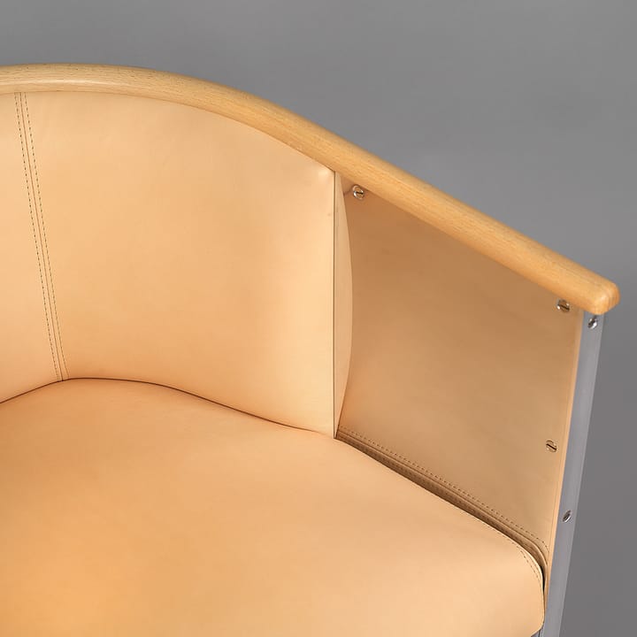 Aluminum armchair brushed matt, Leather Tärnsjö natural-edge bookbinding Källemo