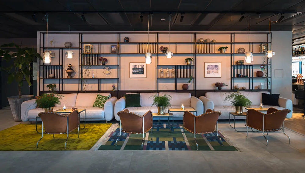 Bruno armchair, Core leather cognac-chrome Källemo