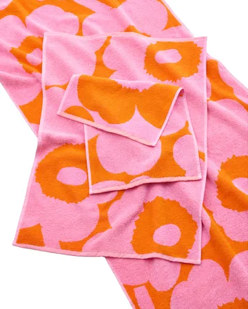 Unikko guest towel 30x50 cm - Orange-pink - Marimekko