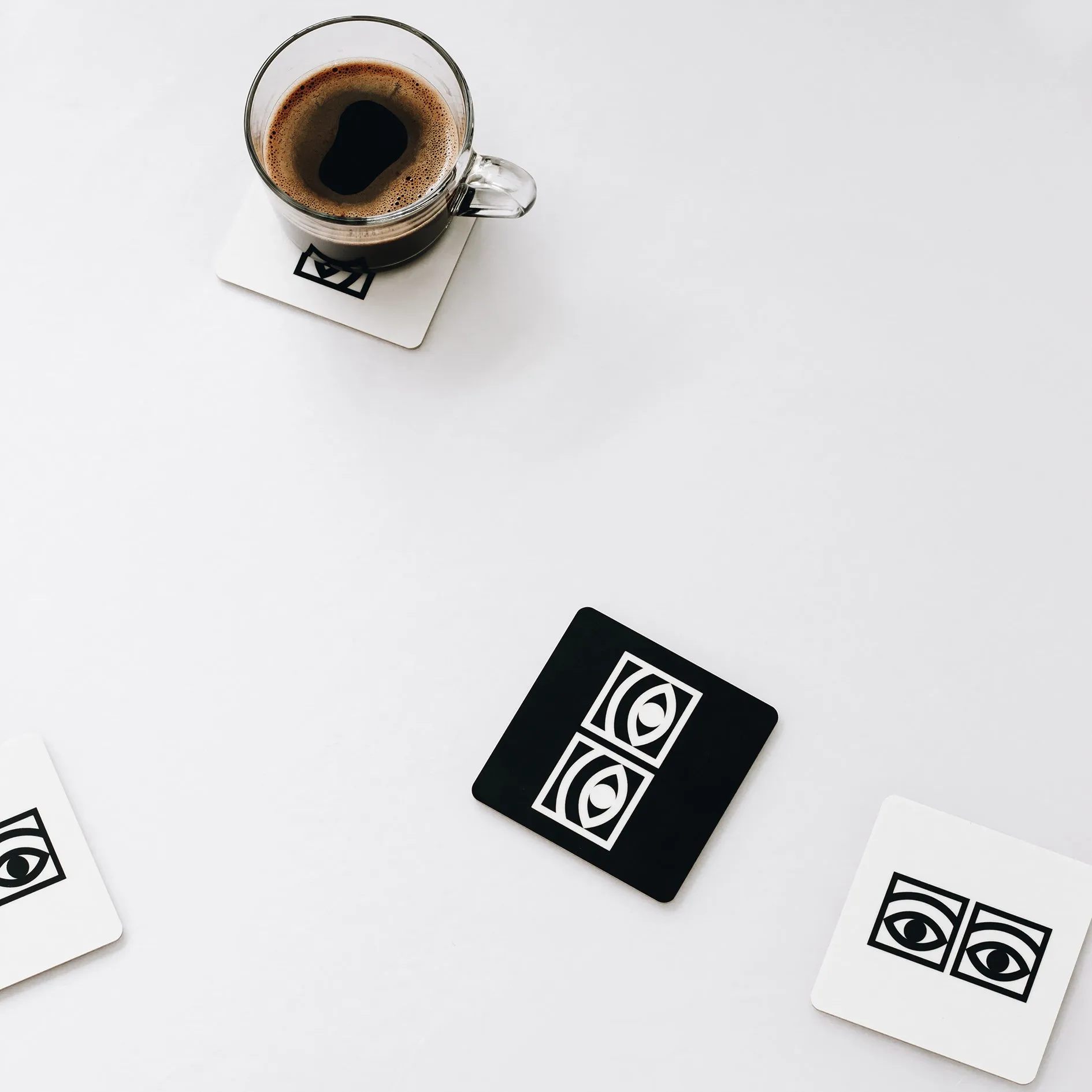 Ögon glass coasters 4-pack, White Olle Eksell