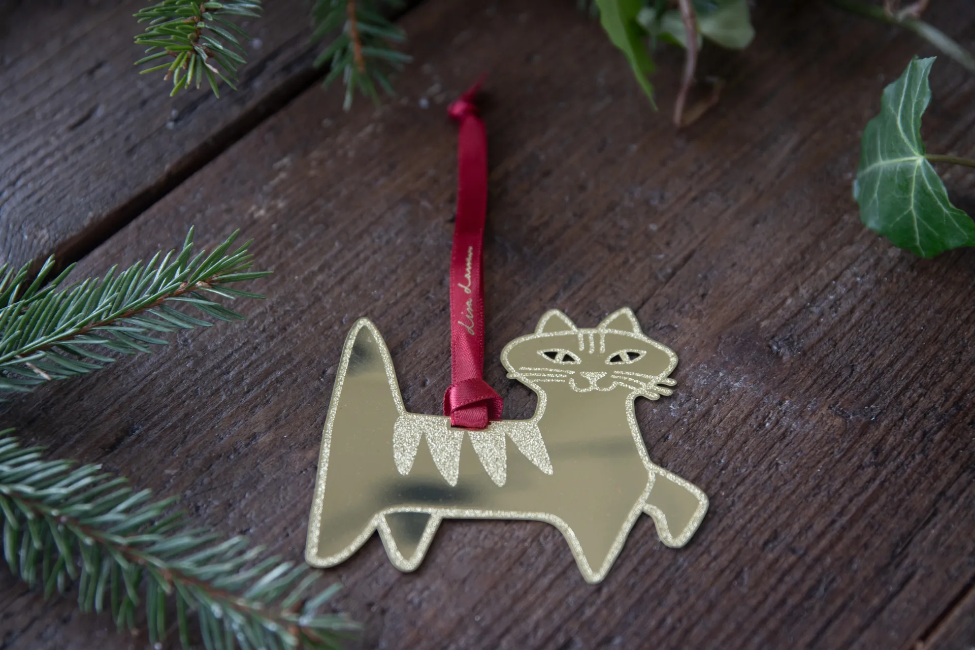 Lisa Larson Felix decorative pendant, Gold Pluto Design