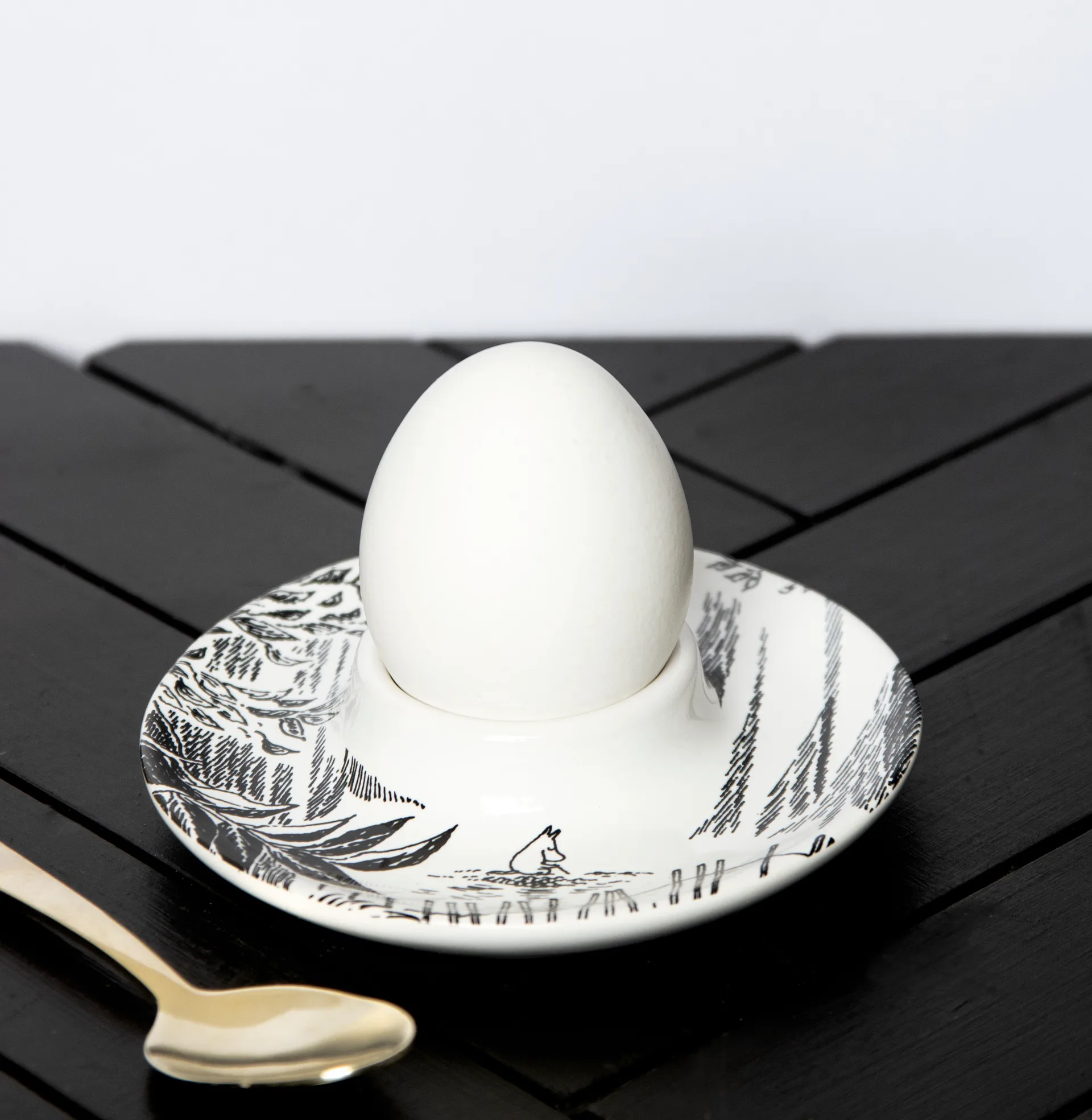 Moomin egg cup with saucer, Black-white Pluto Design