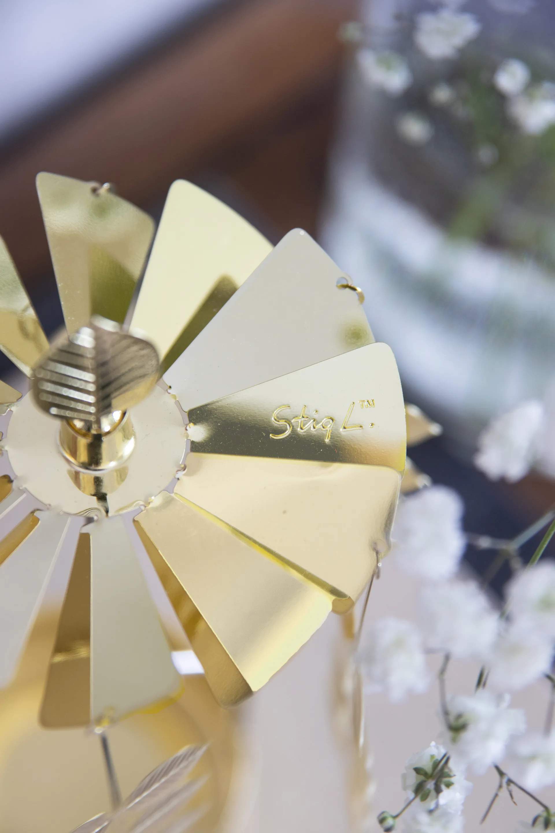 Stig L Berså rotary candle holder medium, Gold Pluto Design