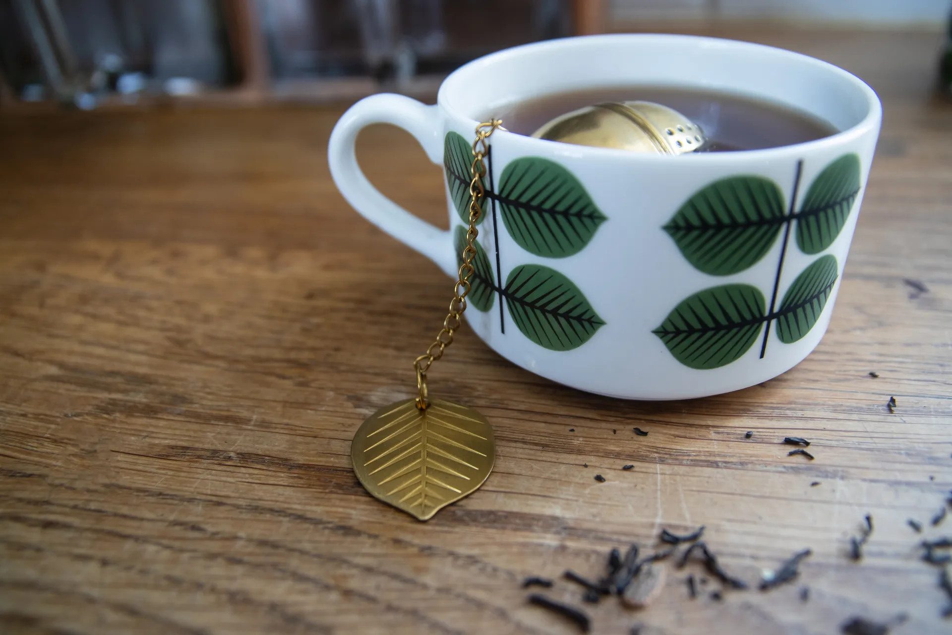 Stig L Berså tea infuser, Gold Pluto Design