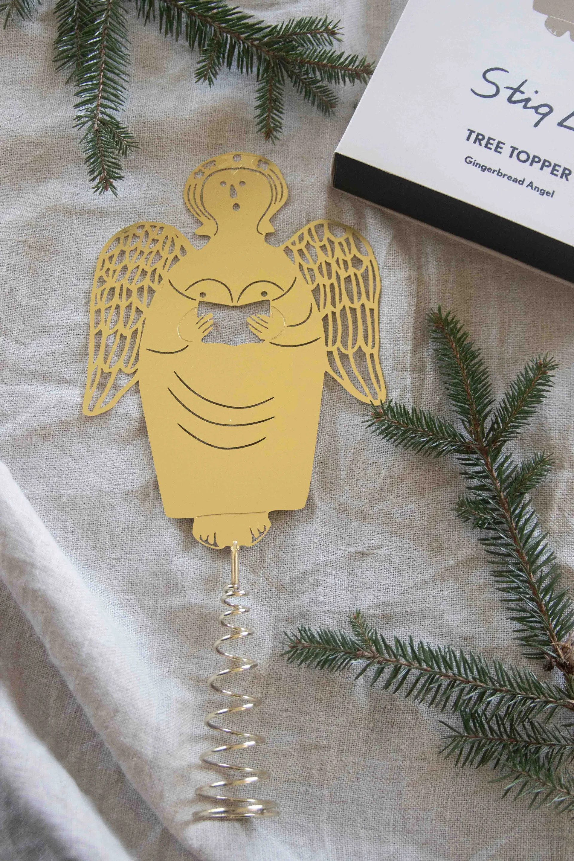 Stig L gingerbread angel Christmas tree topper, Brass Pluto Design