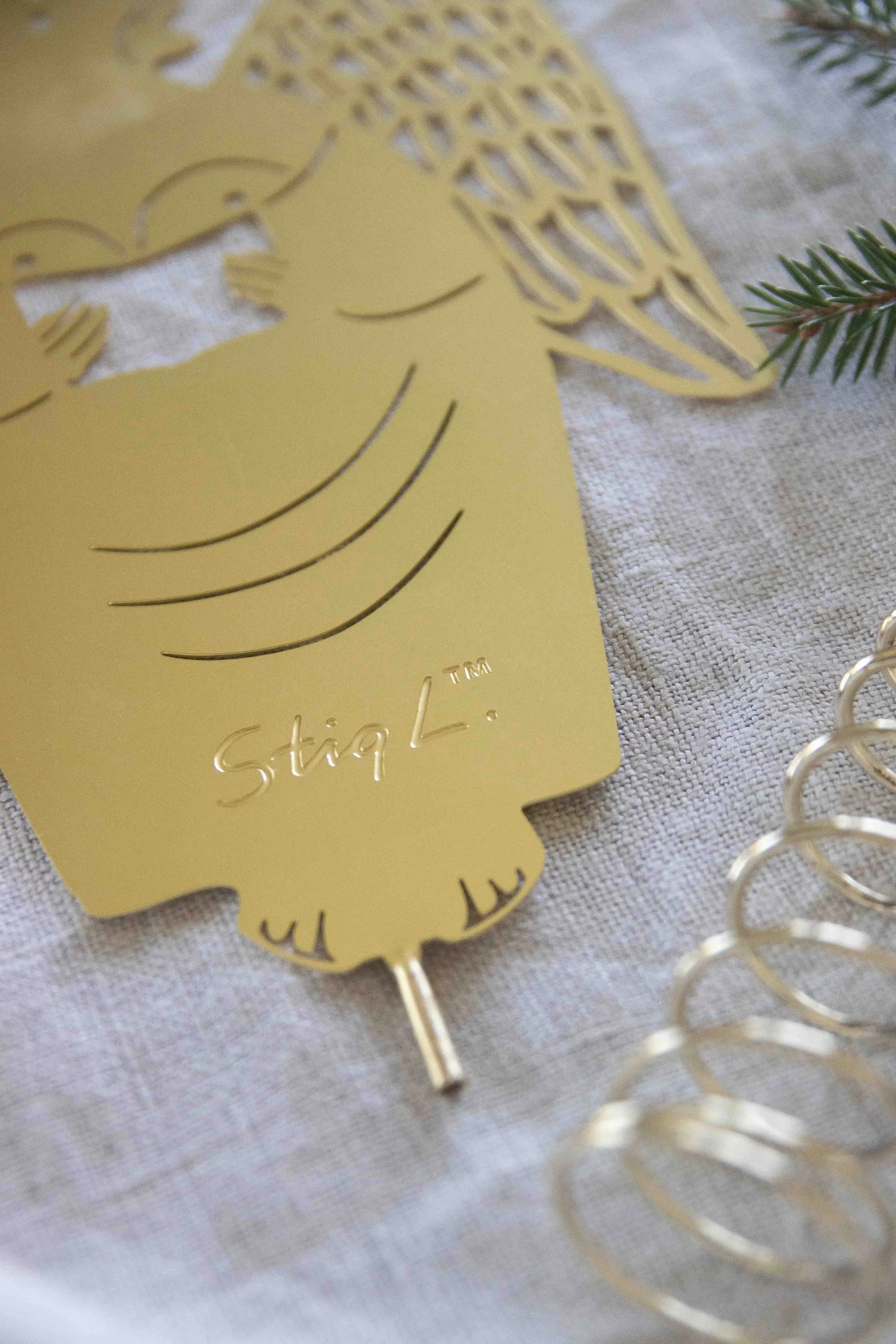 Stig L gingerbread angel Christmas tree topper, Brass Pluto Design
