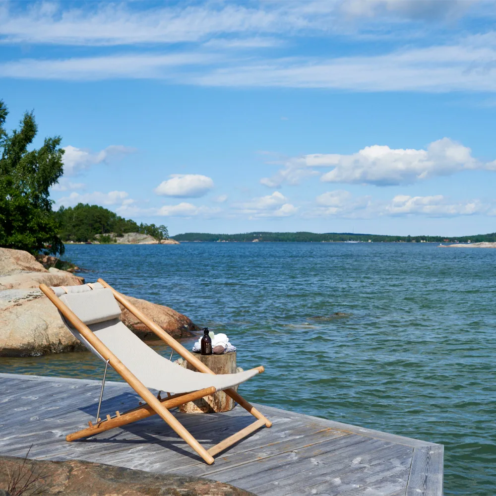 H55 lounge chair teak, Agora Nautic navy blue Skargaarden