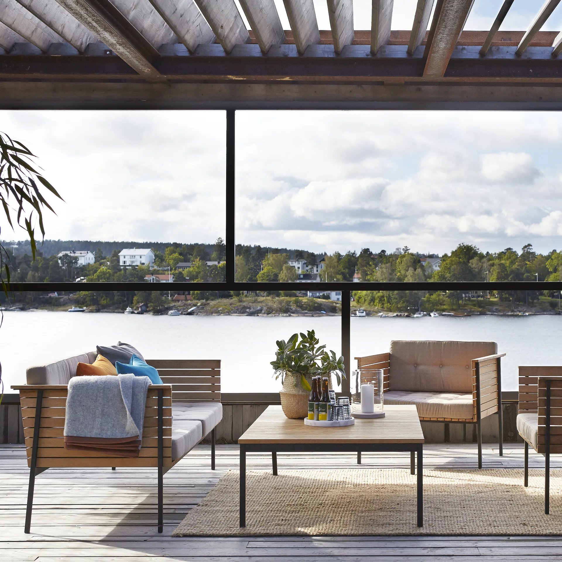 Häringe coffee table, Teak, small, black steel frame Skargaarden