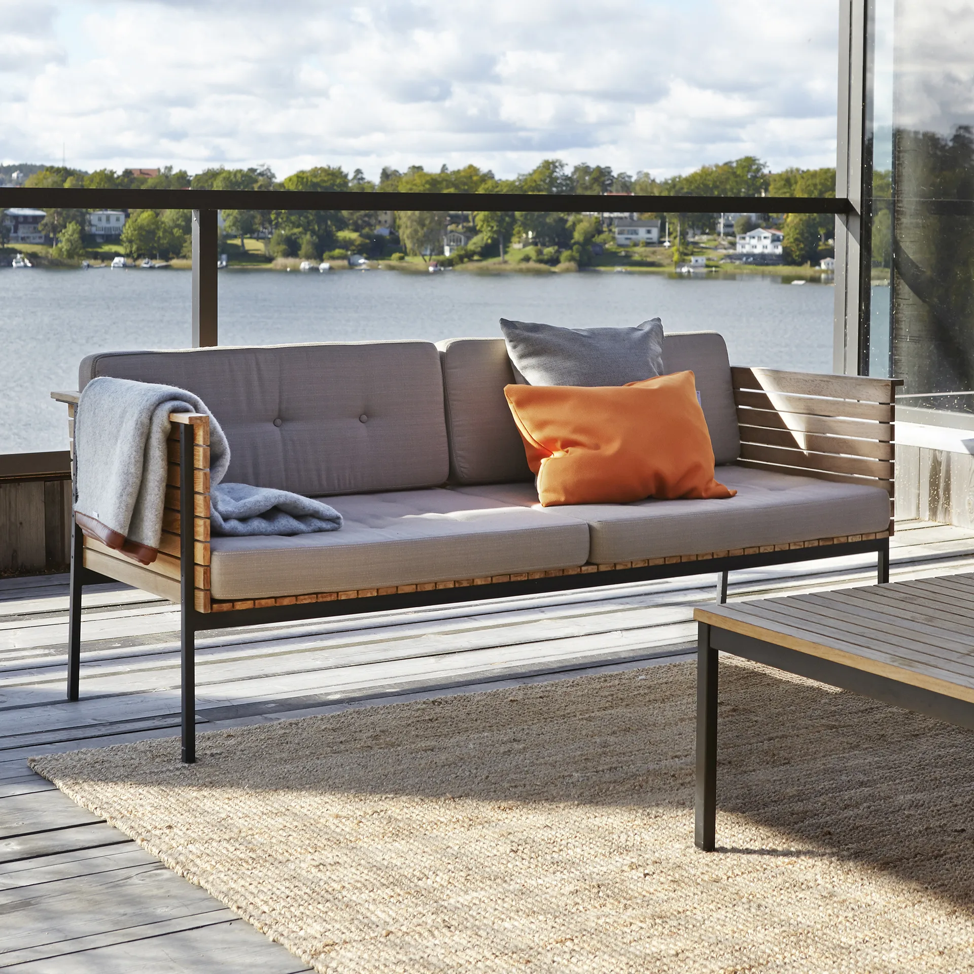 Häringe coffee table, Teak, small, black steel frame Skargaarden