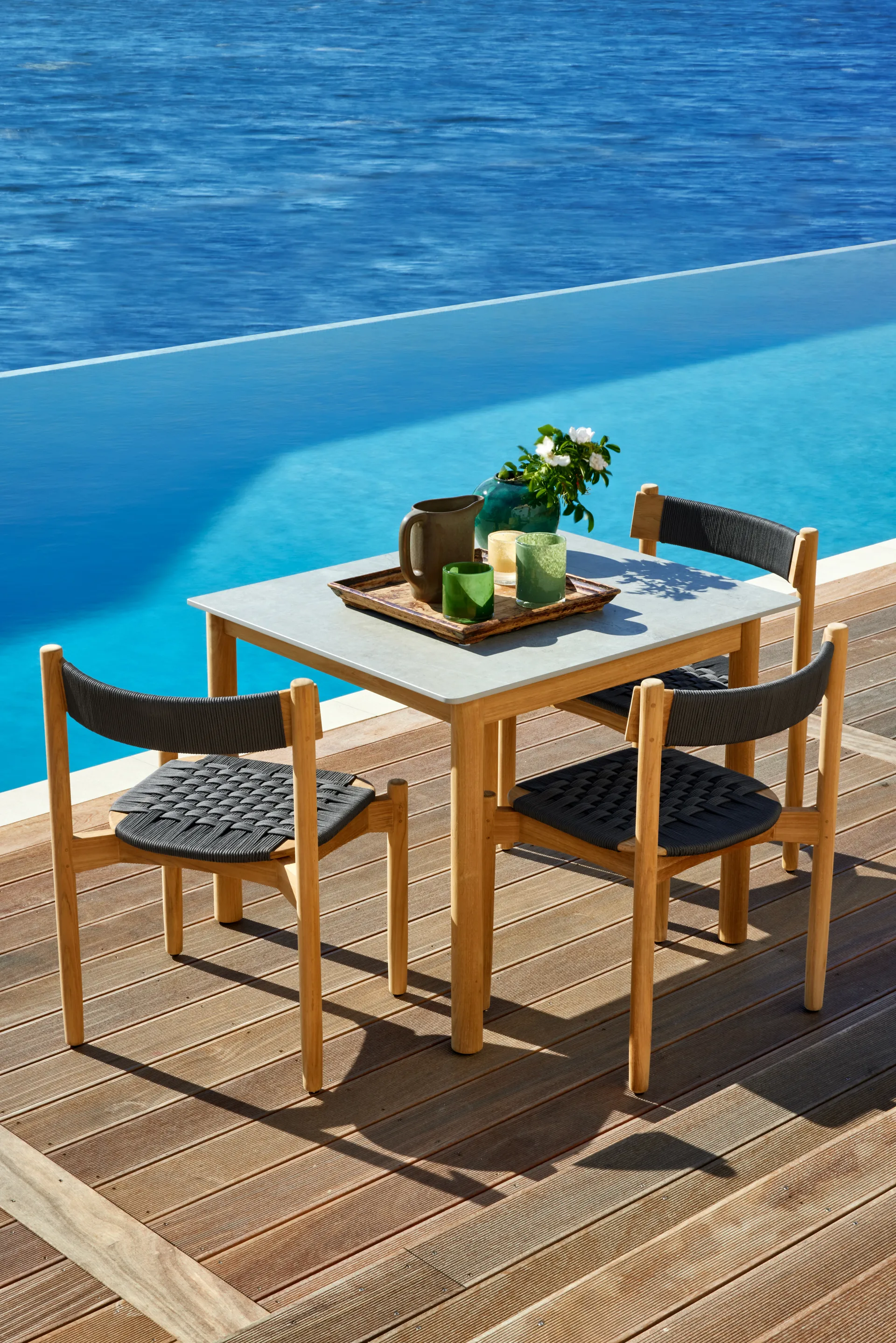 Koster dining table 98x95x74 cm composite table top and teak Skargaarden
