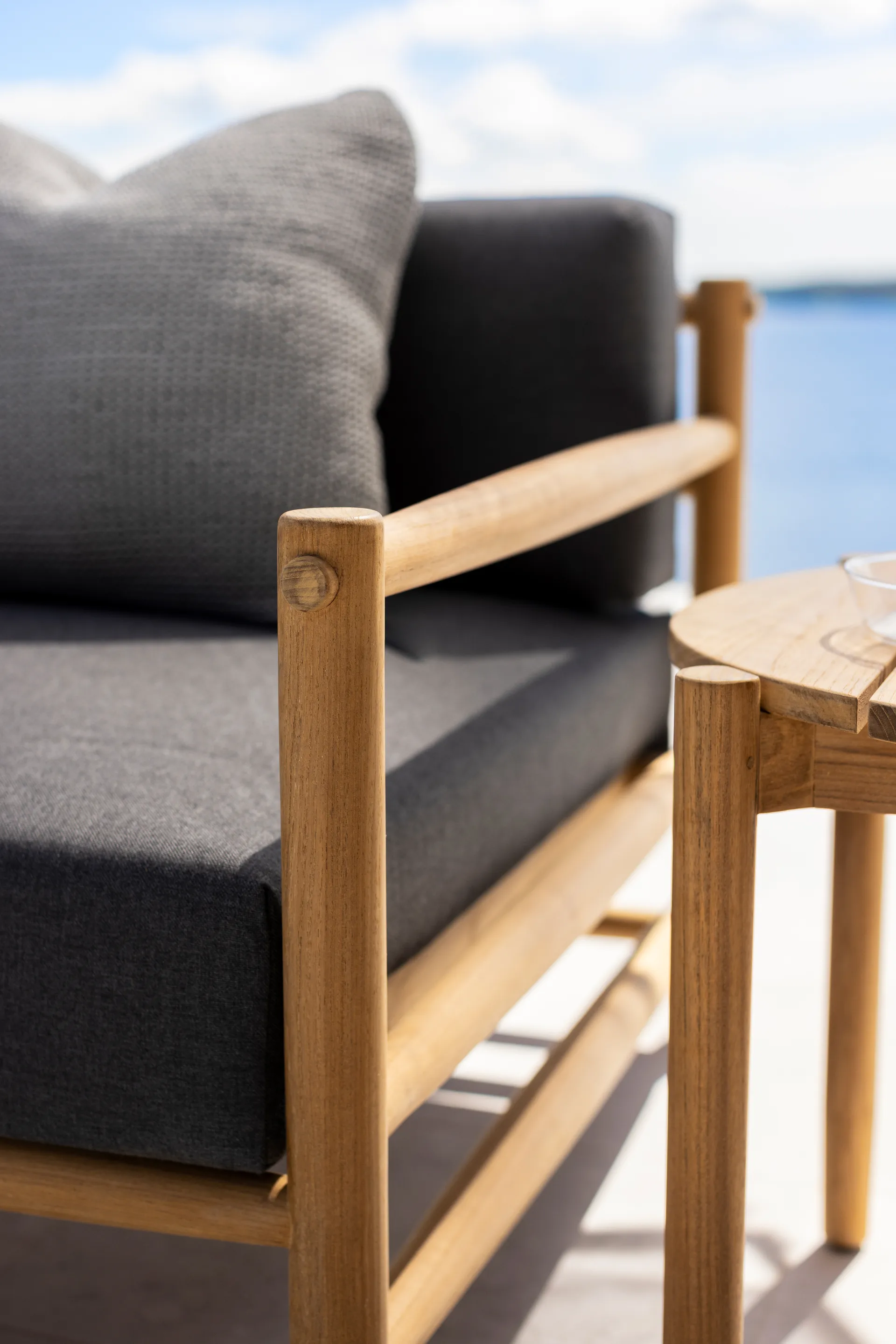 Saltholm lounge armchair teak-grey brown cushion Skargaarden