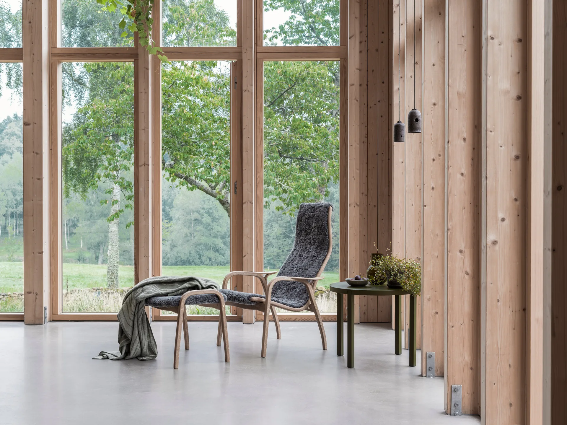 Lamino armchair and footstool oiled oak/sheepskin, Moonlight (beige) Swedese