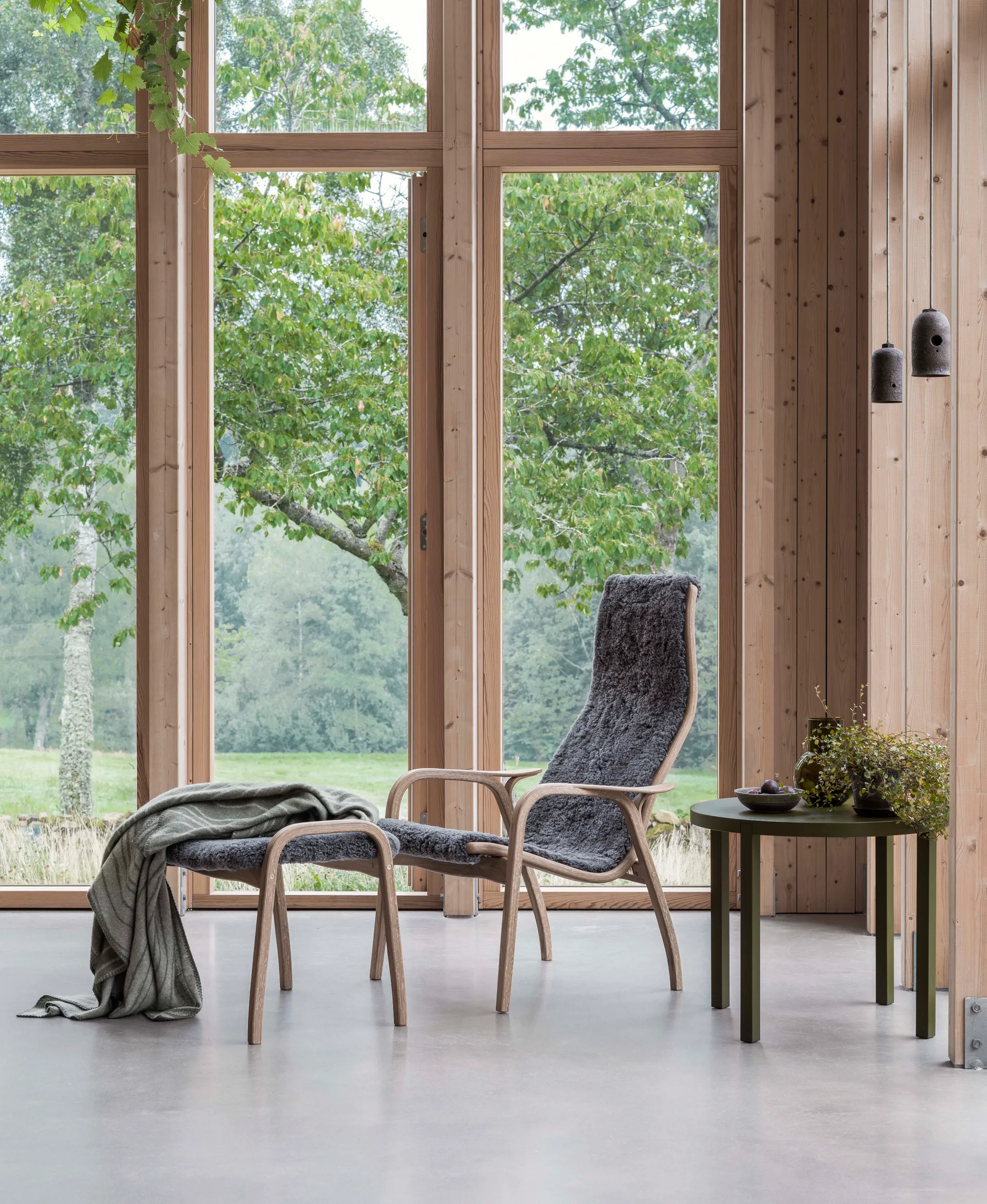 Lamino armchair and footstool oiled oak/sheepskin, Scandinavian Grey Swedese