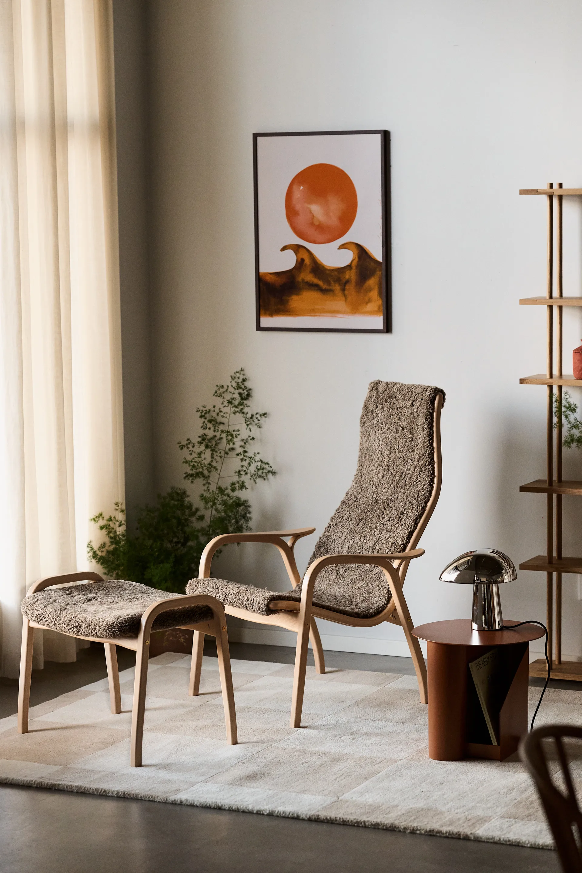 Lamino armchair and footstool varnished beech/sheepskin, Sahara (nougat-brown) Swedese