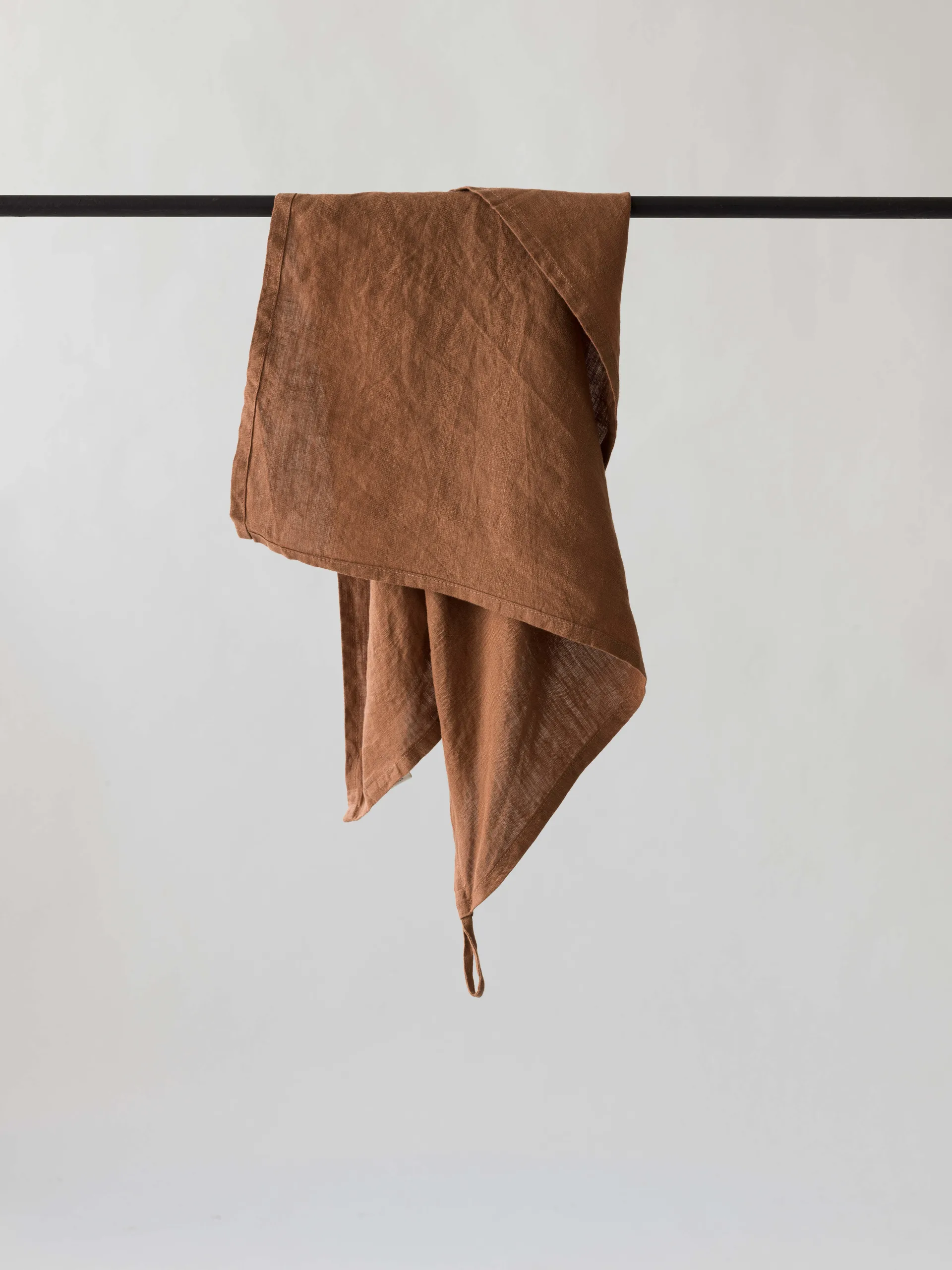 Washed linen napkin, amber (brown) Tell Me More