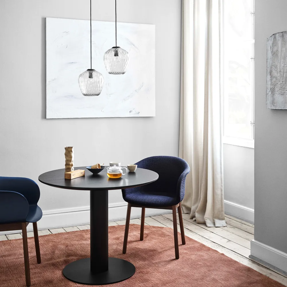 In Between SK11 dining table, Black lacquered oak. matte black metal stand &Tradition