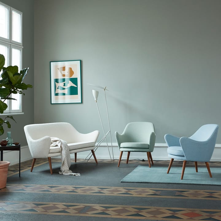 Dwell lounge chair - Fabric merit 021 light cyan, legs in smoked oak - Warm Nordic