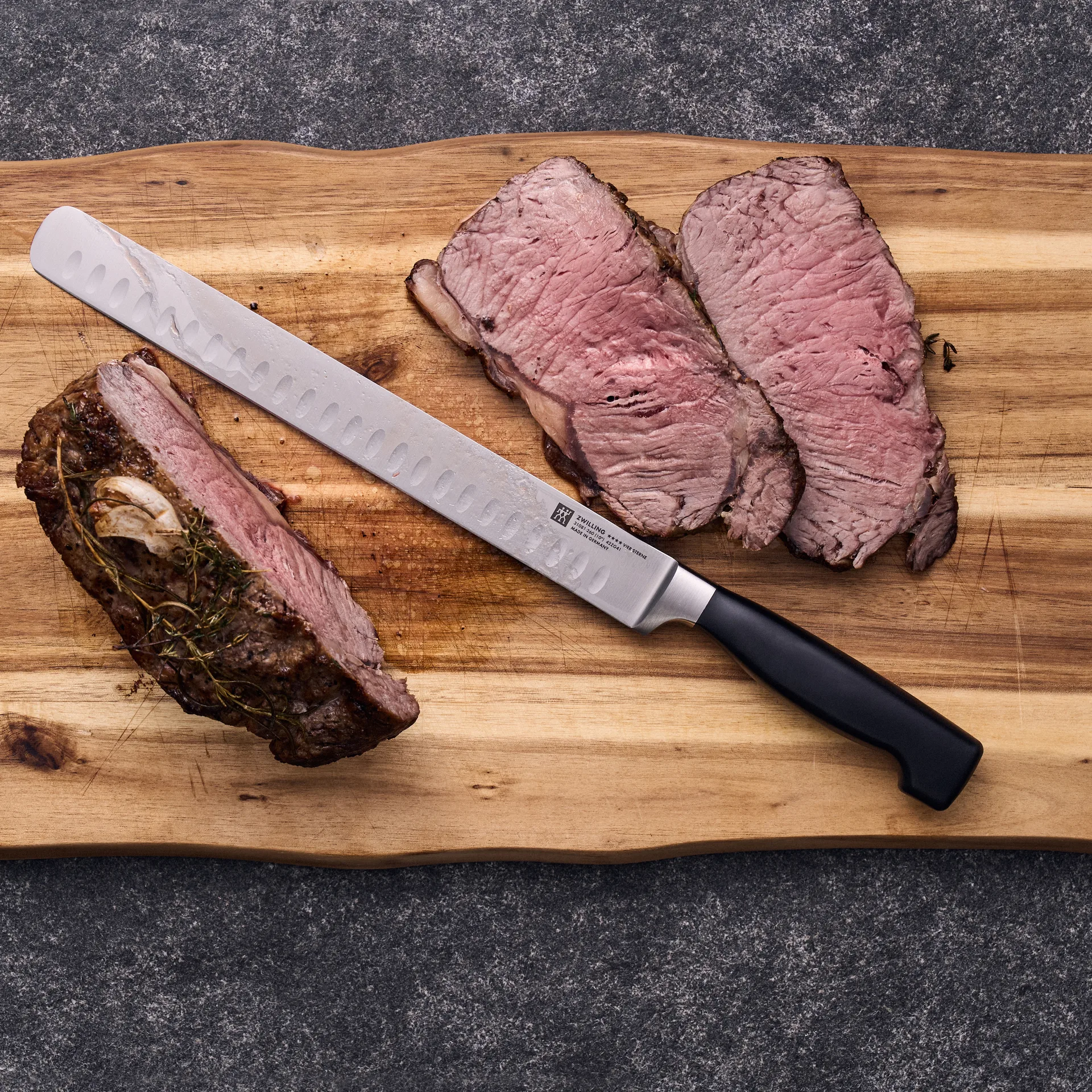 Zwilling Four star filleting/carving knife 26 cm, Black-stainless steel Zwilling