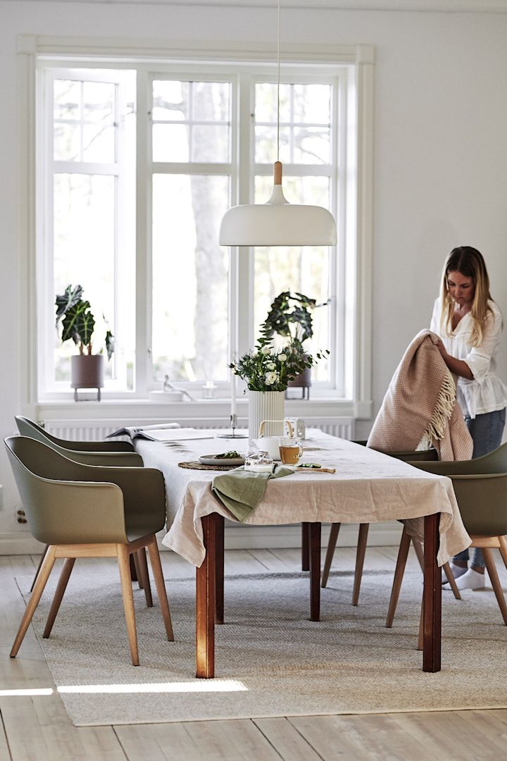 Acorn pendant lamp from Northern,By linen table cloth from House Doctor, Tunes candle sticks from Georg Jensen  