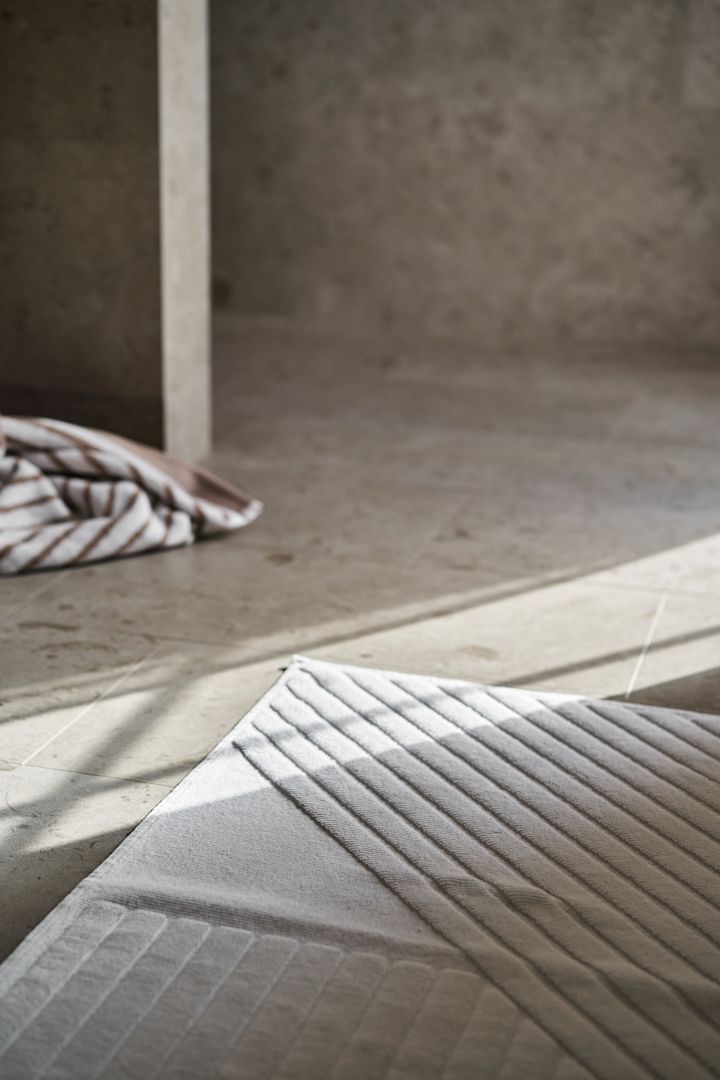 The Stripes bathmat in white from NJRD. 