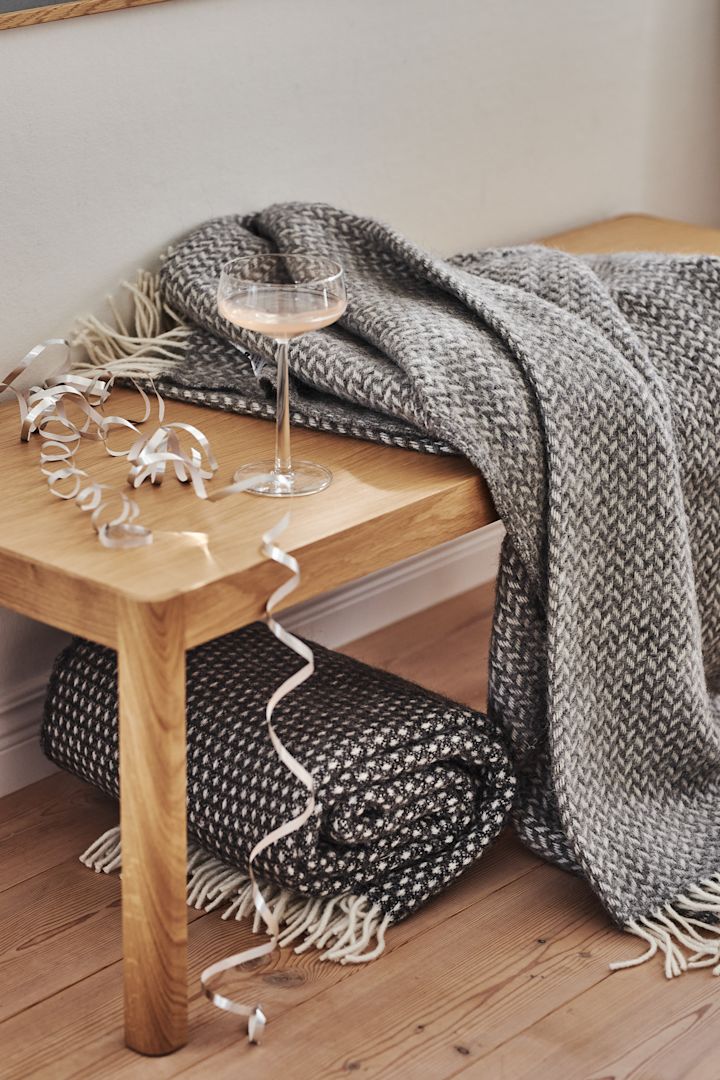 Design gifts for all occasions - the Polka wool blankets in grey and black from Klippan Yllefabrik are a must for anyone who loves to snuggle up.