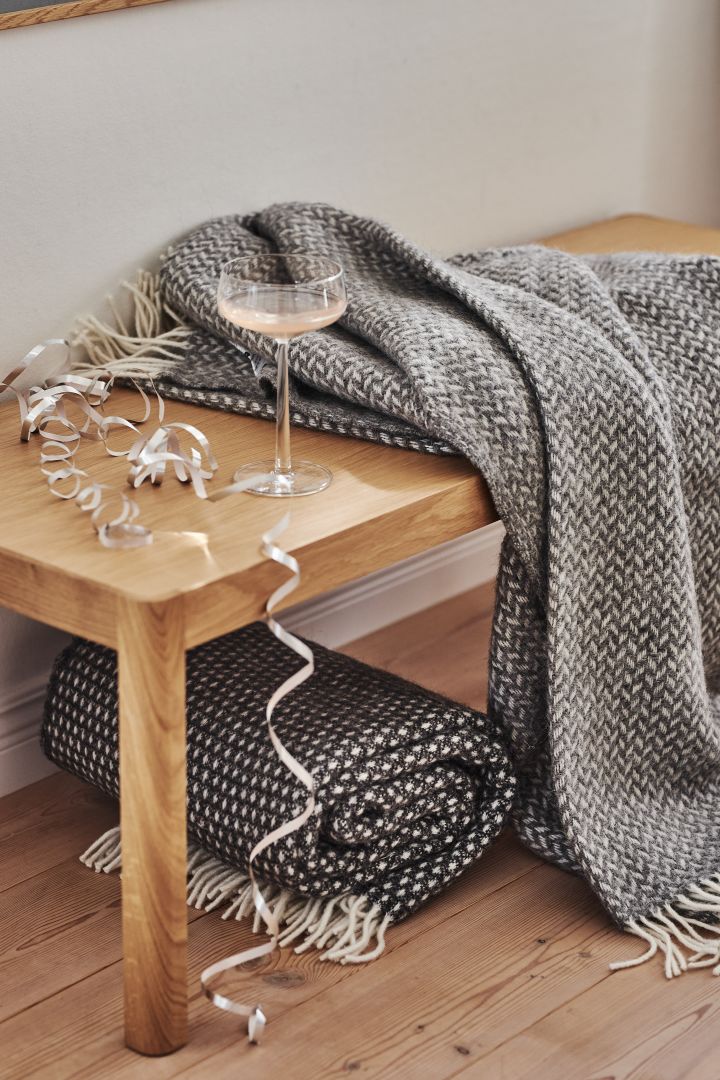 Design gifts for all occasions - the Polka wool blankets in grey and black from Klippan Yllefabrik are a must for anyone who loves to snuggle up.