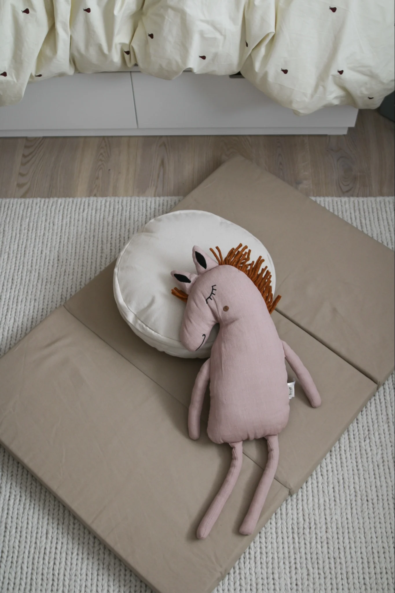 ferm LIVING has some adorable accessories for a children's bedroom like this Safari cushion horse.