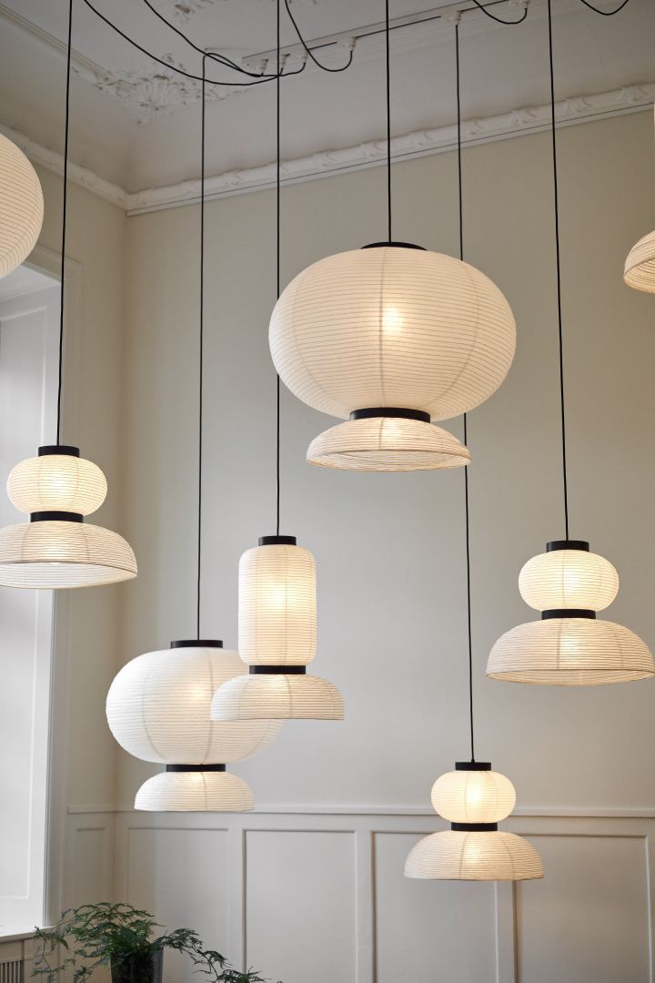 Interior design trends for autumn 2022 are all about statement pieces like the Formakami ceiling lamp from &Tradition, seen here in all the styles hanging as an art installation.