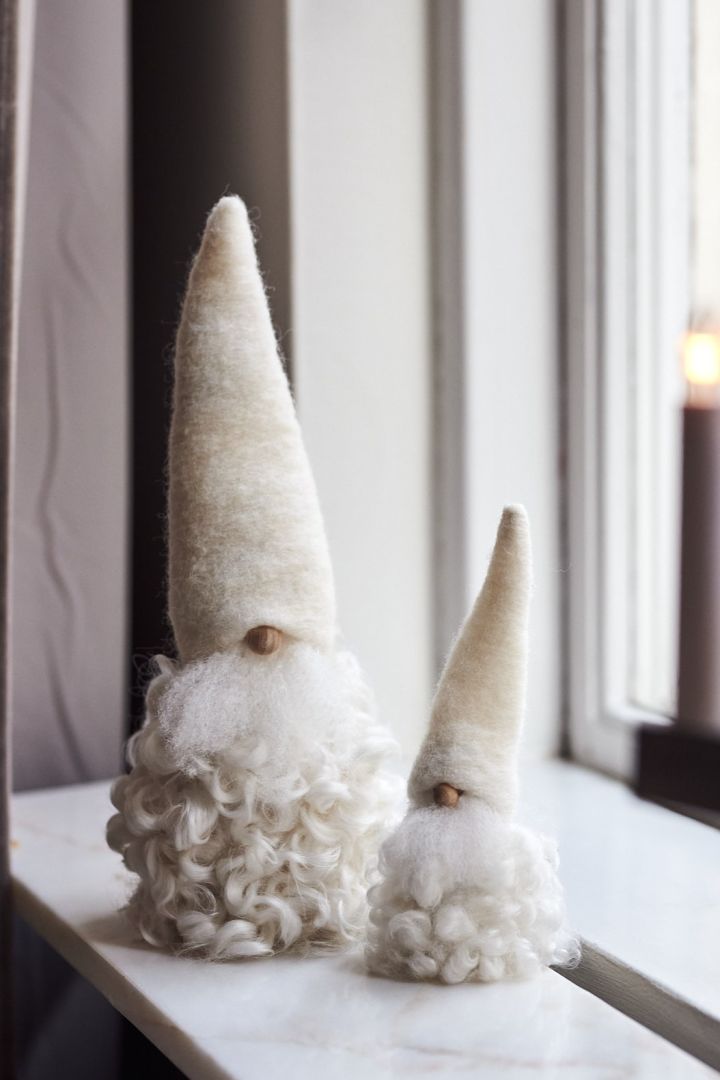 How to decorate with traditional Scandinavian Christmas decorations - Traditional wool santas are very common all over Scandinavia. This handmade pair are from Monikas Väv & Konst and look perfect on the windowsill. 
