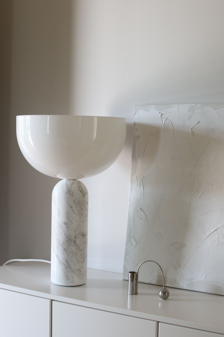 Refresh your home with modern lighting ideas - here you see the Kizu table lamp from New Works in white marble.